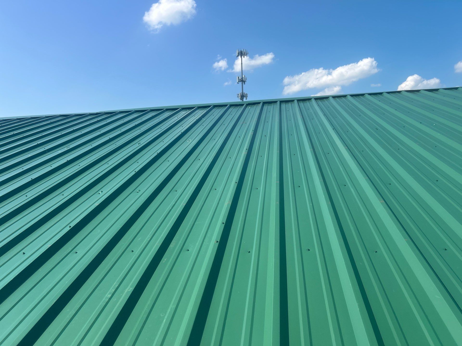 Commercial Roofing Repair using Ag panel green  by Nitro Roofing and Construction
