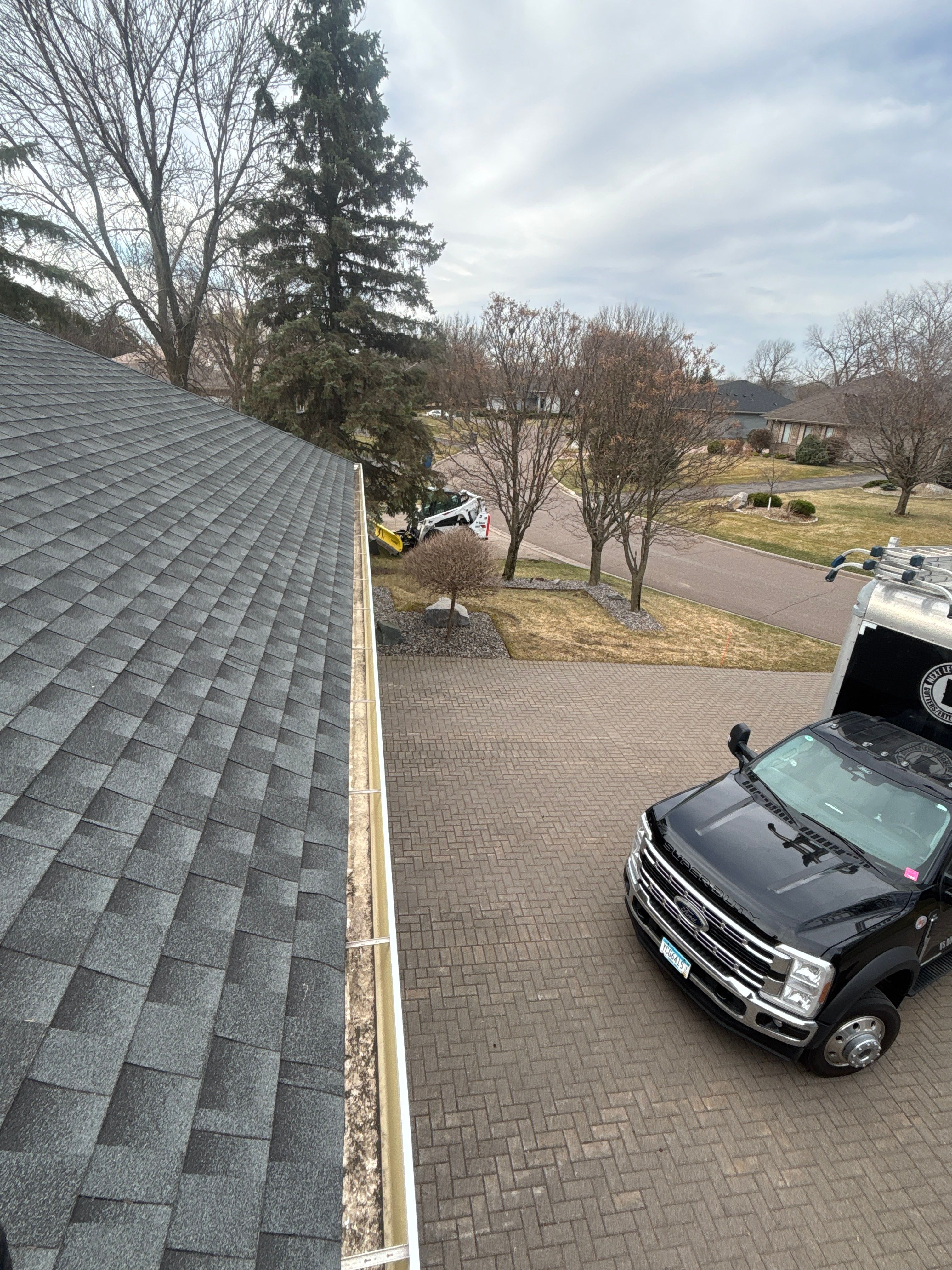 Residential Gutter Cleaning and Heat Cable Maintenance in Hopkins