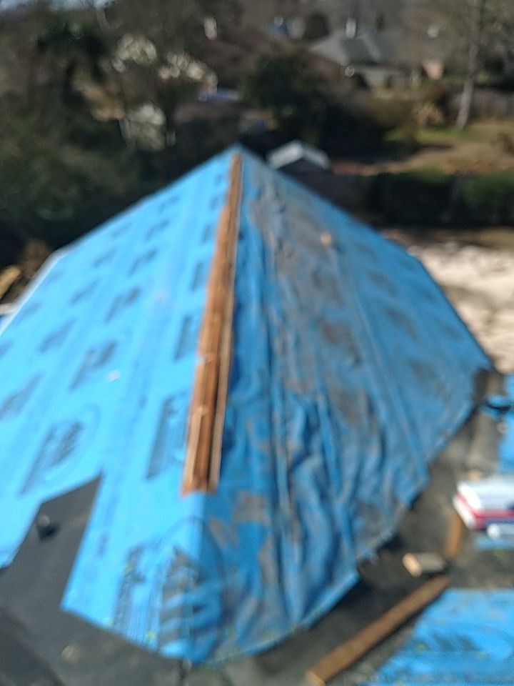 Residential Roofing Installation using Roof Replacement by American Roofing & Construction LLC