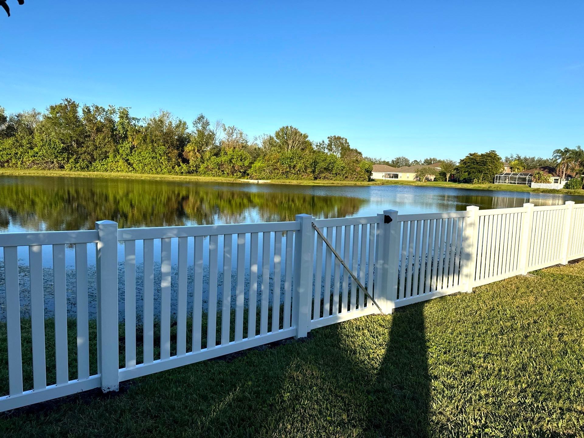 Vinyl Picket Fence Installation using 6Ft White Vinyl Privacy Fence with a 4Ft White Clearwater Picket Fence by Asap fence and gates, LLC