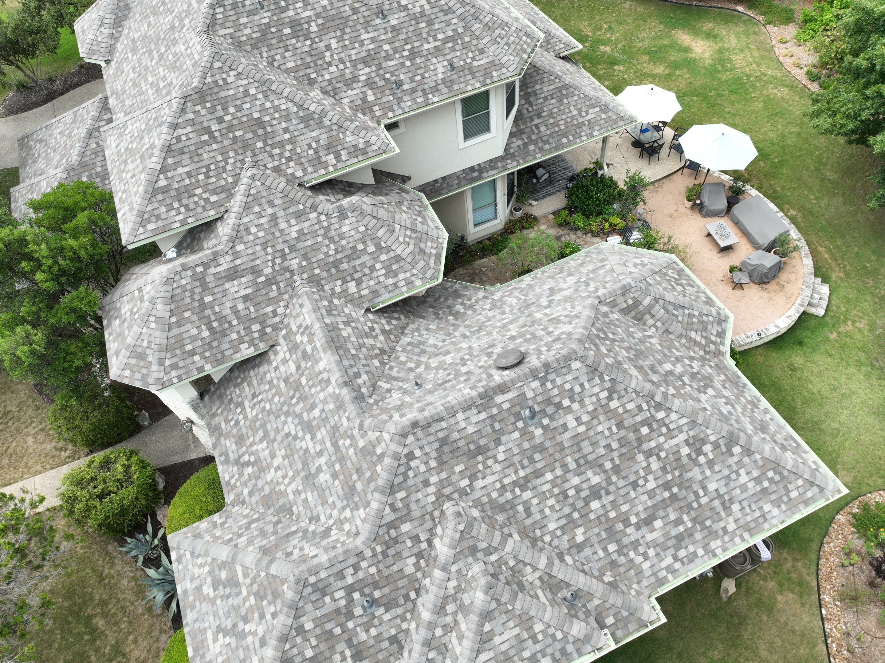 Residential Roof Replacement using 30 Year Laminate Shingles with High Profile Ridge by Premier Roofing and Contracting