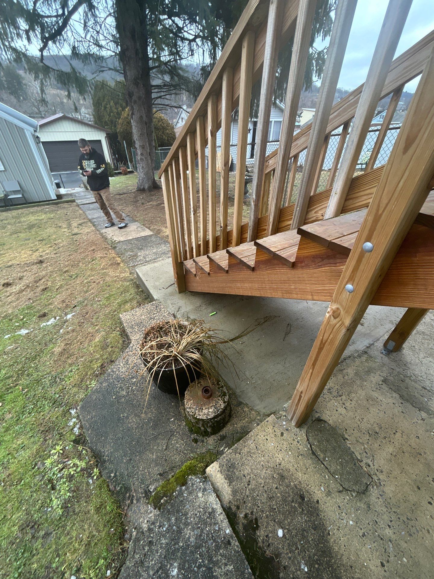 Pressure-Treated Wooden Staircase and Concrete Footing Installation in Schuylkill Haven by Herts Roofing & Construction
