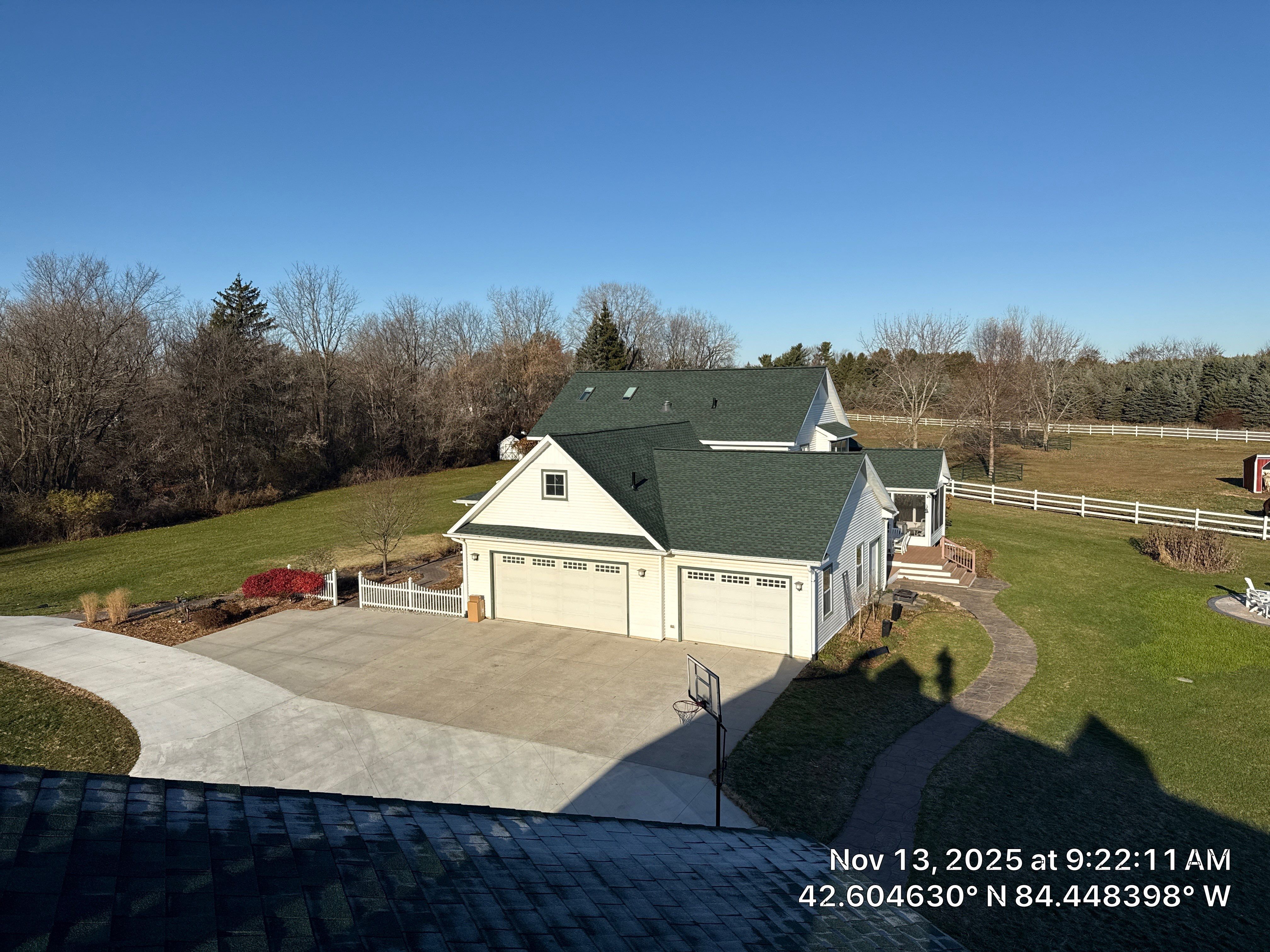 Residential Roofing Replacement with Multiple Skylights in Mason, Michigan by Acme Exteriors
