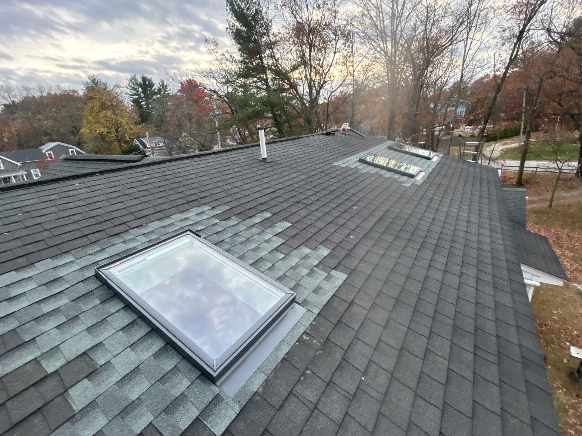 Chelmsford Triple Skylight Leak Repair with Fascia & Shingle Restoration by Mighty Dog Roofing of Greater Middlesex County