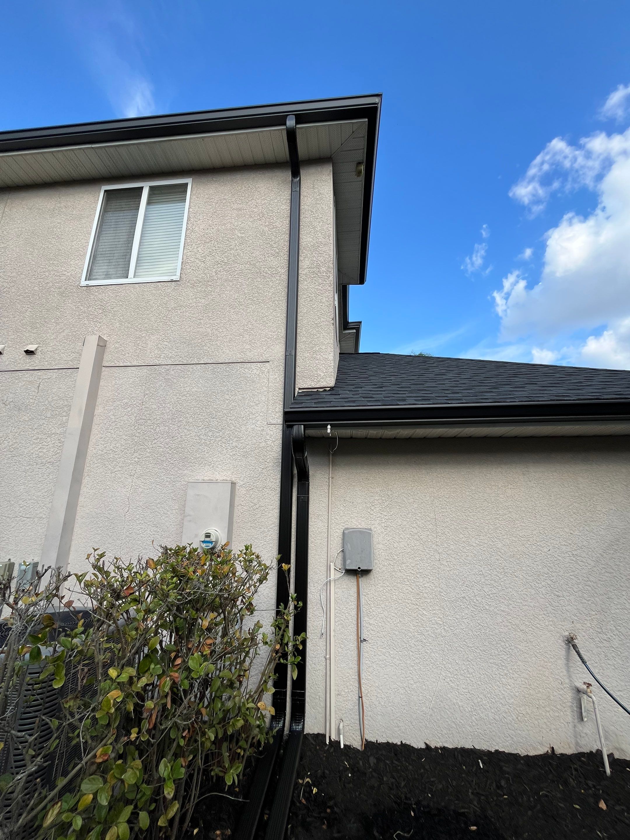 Black 6-inch Seamless Gutters for Modern Ellenton Homes FL by Gutter Professors