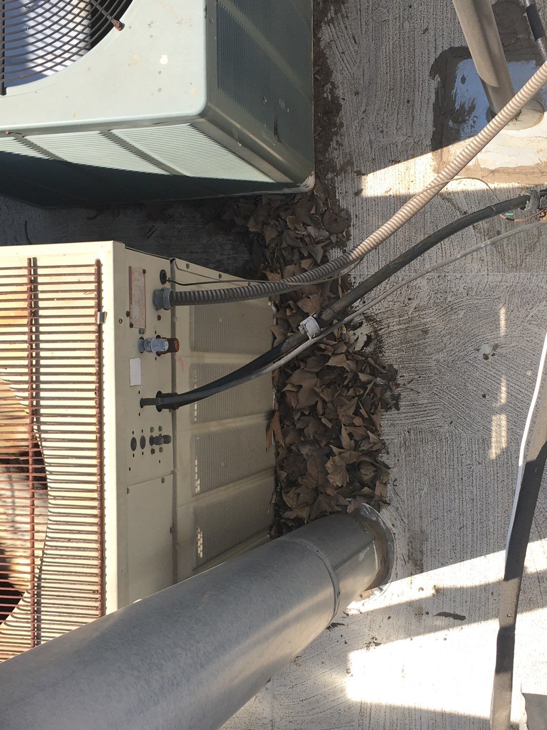 Spray foam and coatings inside commercial building HVAC well using Spray foam and coatings over existing BUR system by Straight Edge Roofing Inc