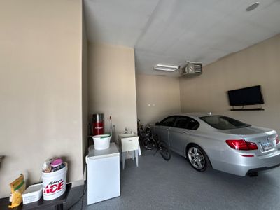 Speckled Grey Epoxy Garage Floor Coating Installation in Tea