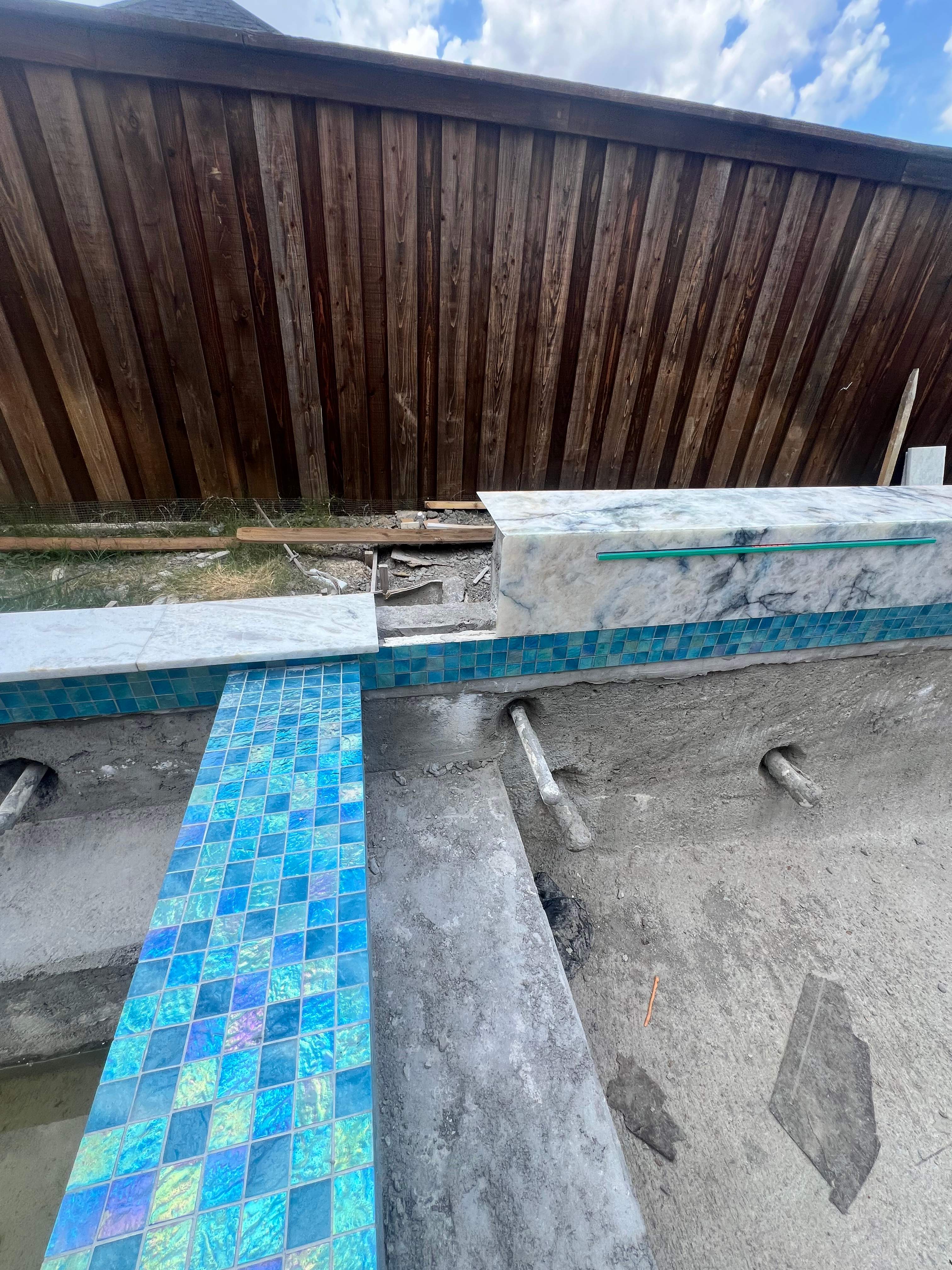 Geometric Pool with Raised Spa and Tanning Ledge by Pinnacle Pools and Spas - DFW