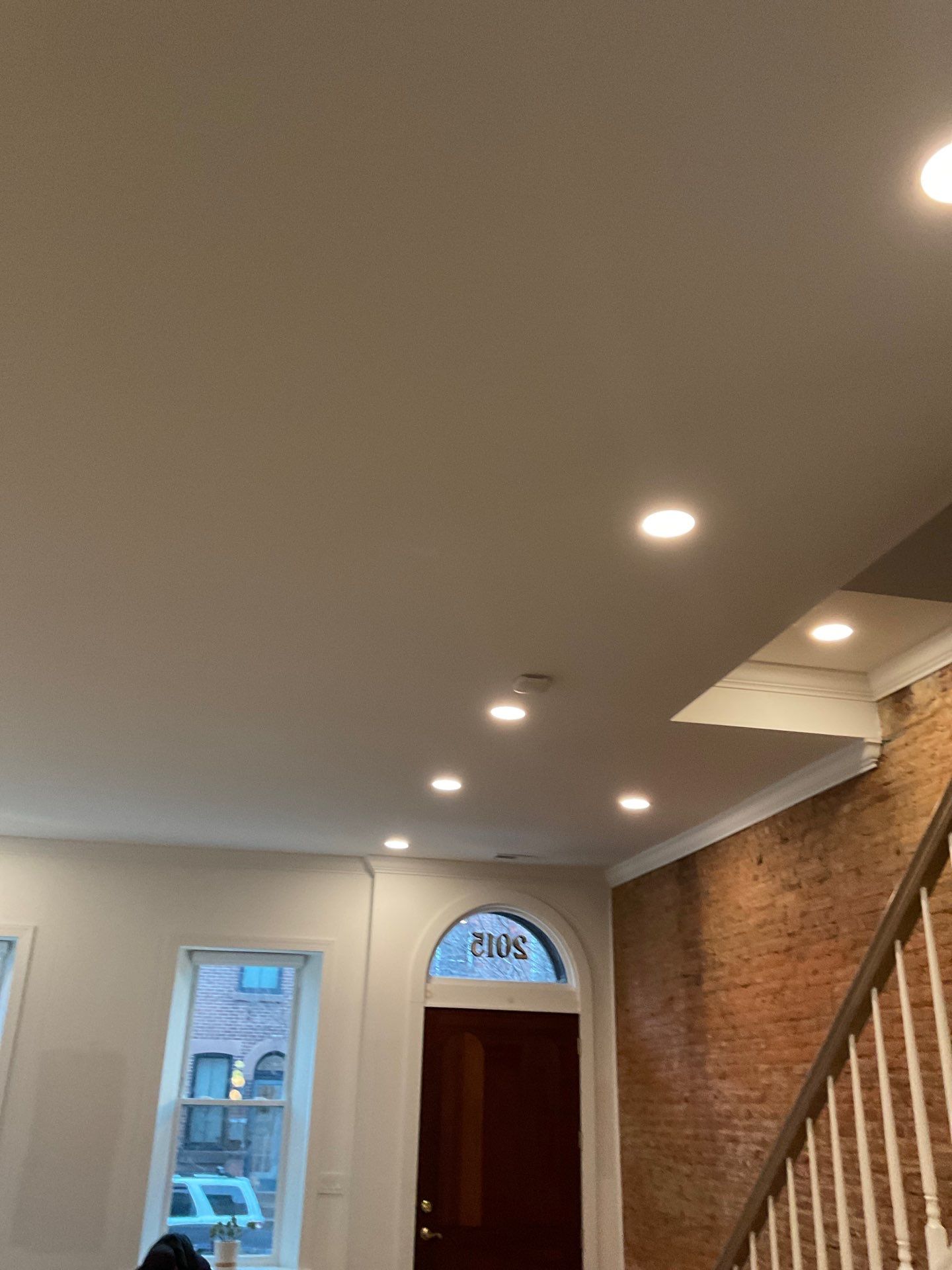 Light Filled Living Spaces and Stairwell Refresh by Groovy Hues