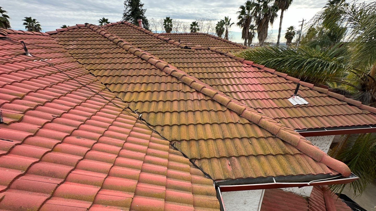 Tile refurbish project using existing tiles and replaced underlayment and battens by Straight Edge Roofing Inc