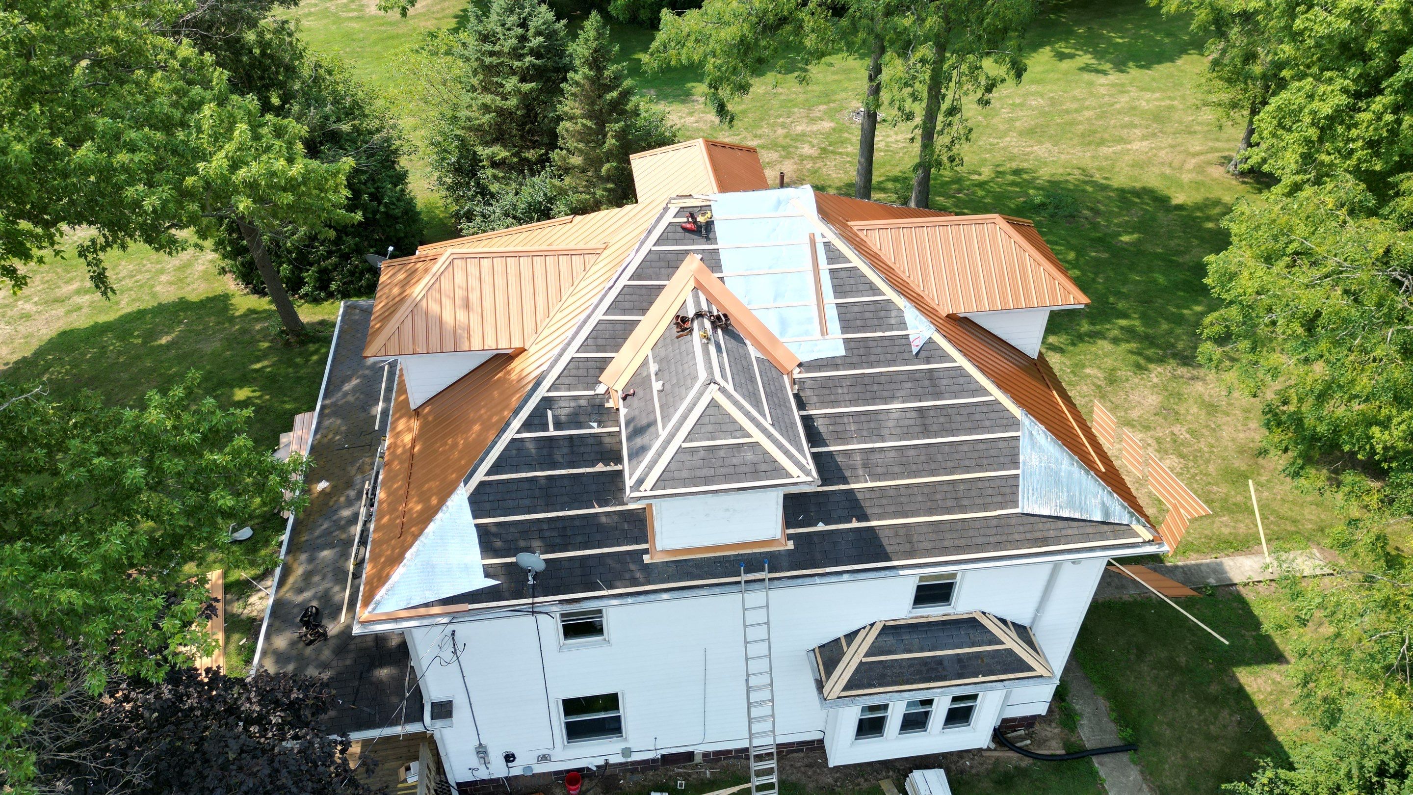 Residential Roofing Installation using Performance Panel Metal - Copper Metallic by RoofX 