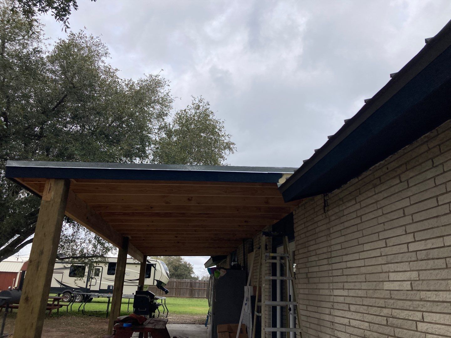 Beeville Backporch sittin' by Bayfront Roofing and Construction