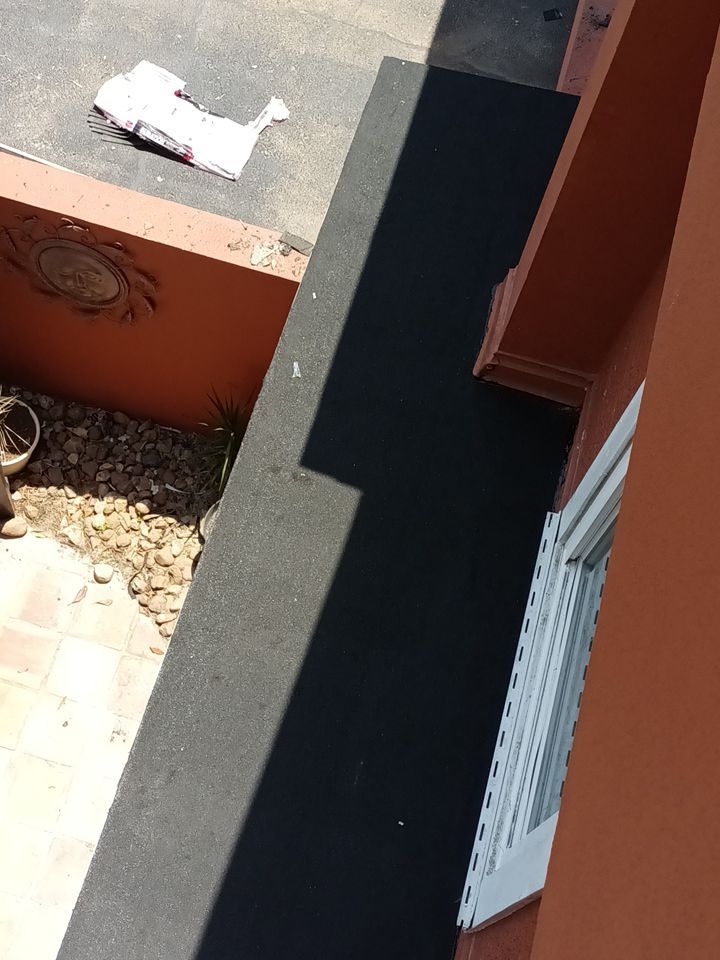 Island Tile Exorcist by Bayfront Roofing and Construction