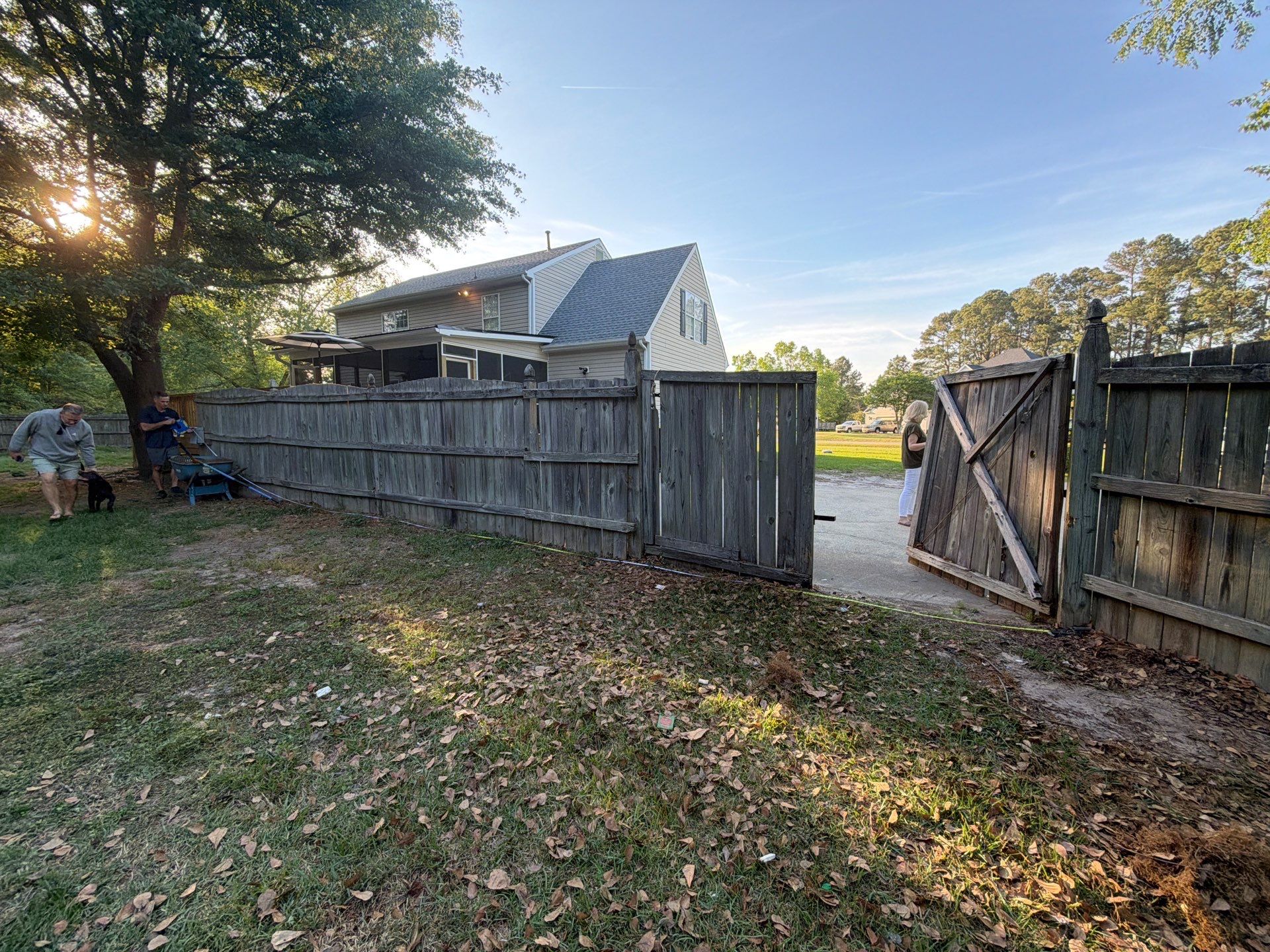 White Vinyl Privacy Fence Replacement with Double Gates in Greenville by Superior Fence and Rail