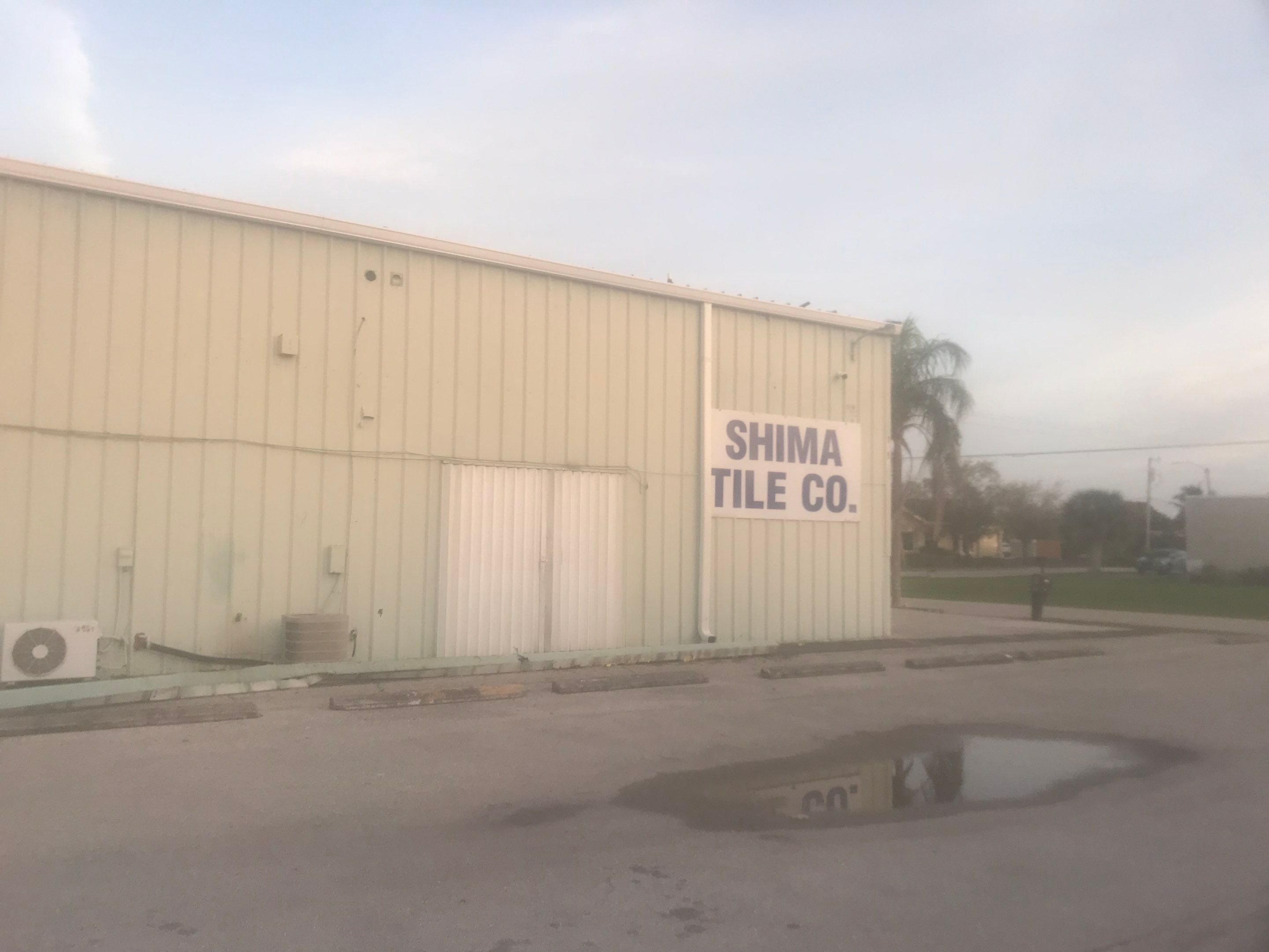 Commercial Gutters using 7 inch seamless gutters in Cape Coral FL by Gutter Professors