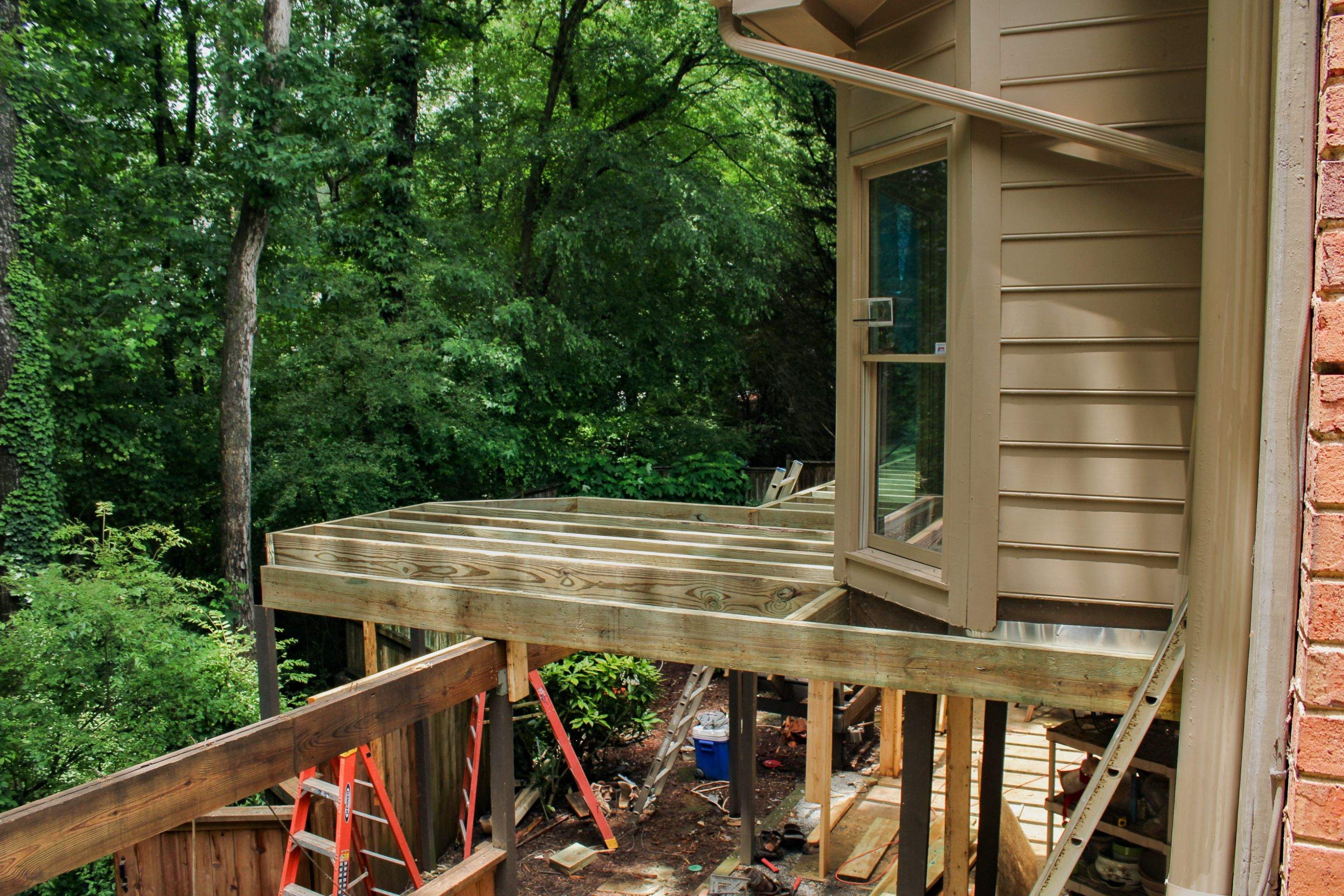 Deckorators Voyage Deck and Shed Style Covered Porch Build with Drink Rail by Nelson Exteriors 