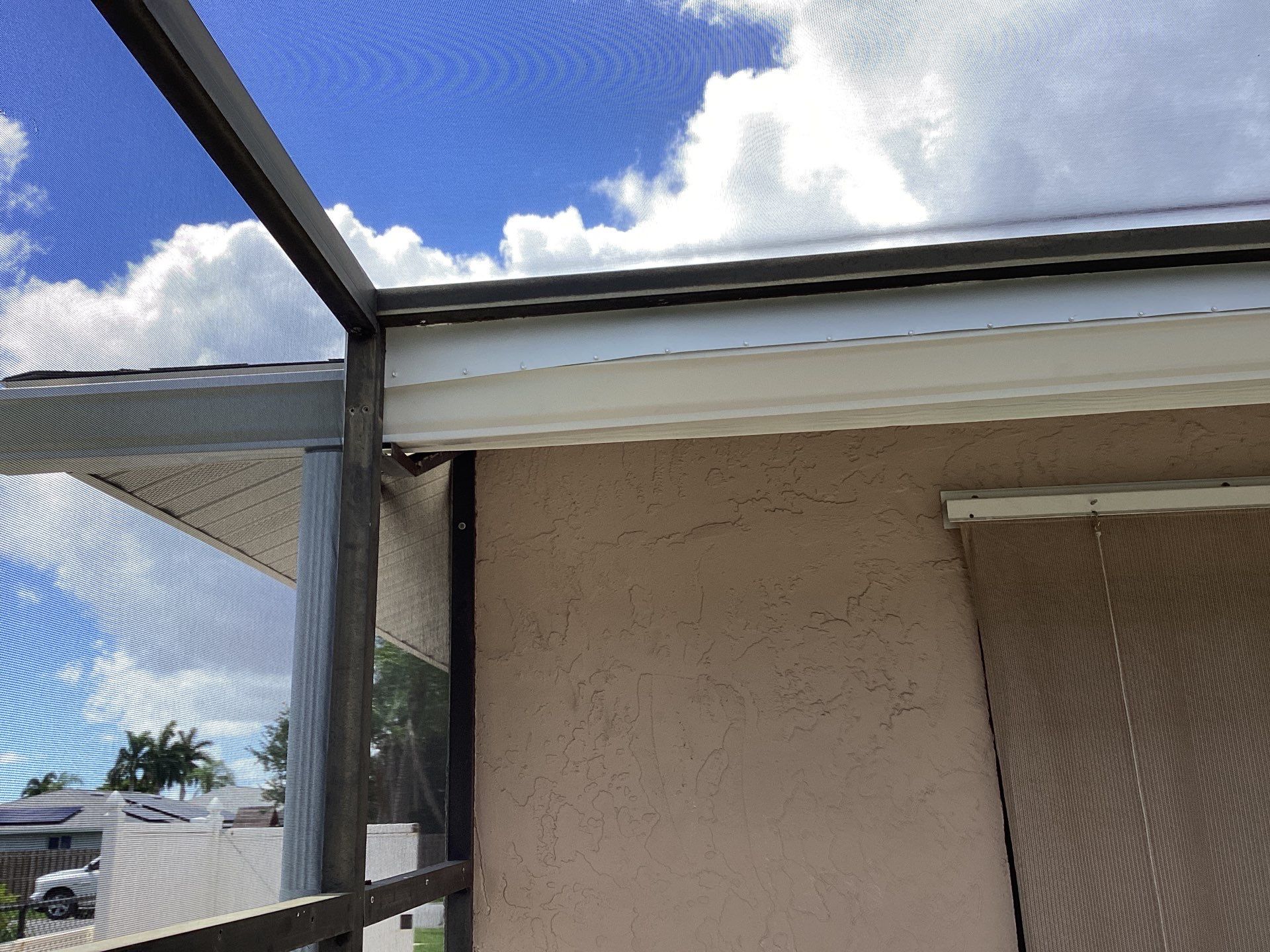 White Seamless Gutters and Splash Guards in Fort Myers FL by Gutter Professor by Gutter Professors