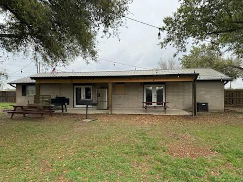 Beeville Backporch sittin' by Bayfront Roofing and Construction