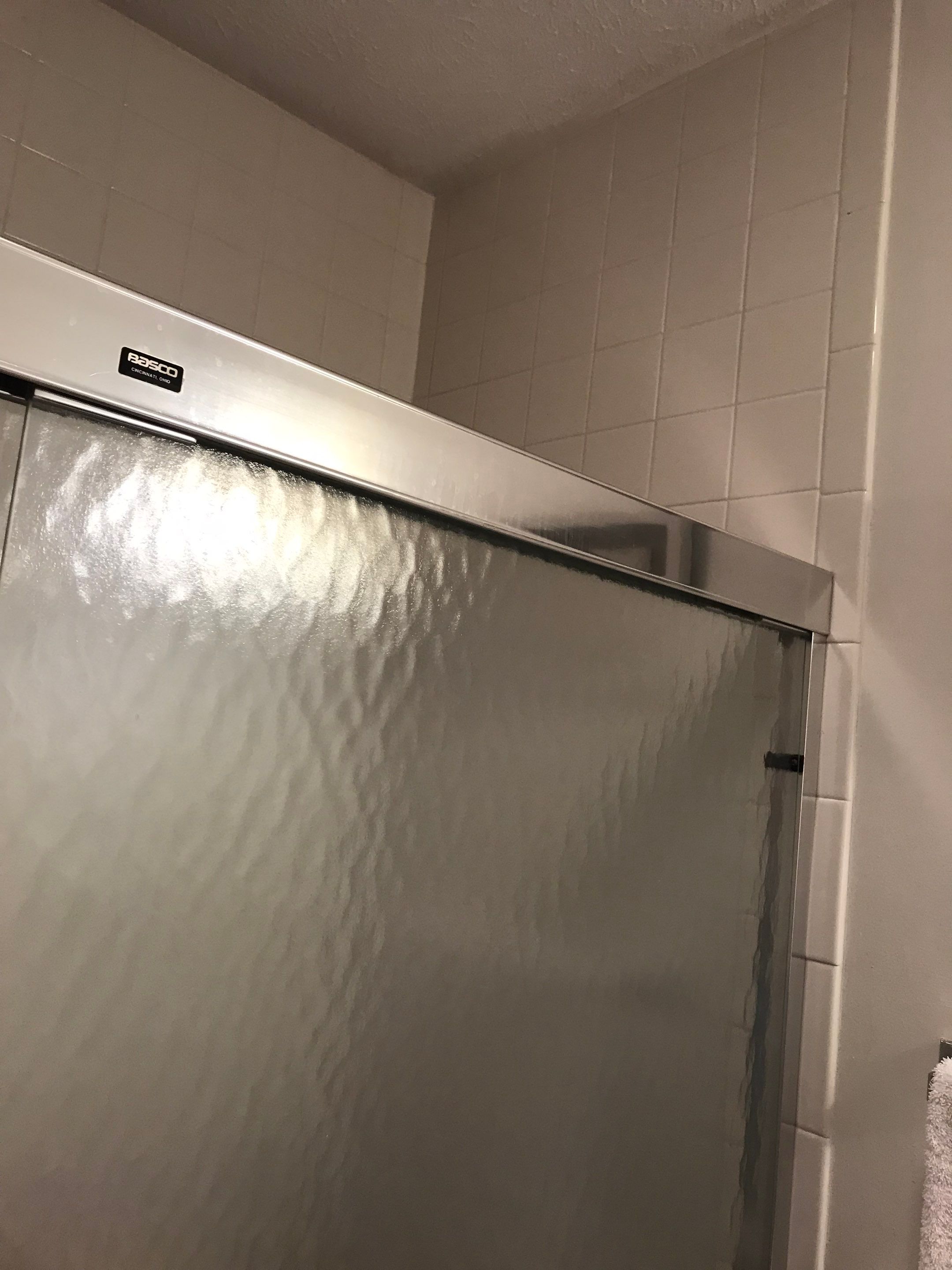 Tub to Shower Conversion using BCI Acrylic Shower System by Secure Construction Company Inc