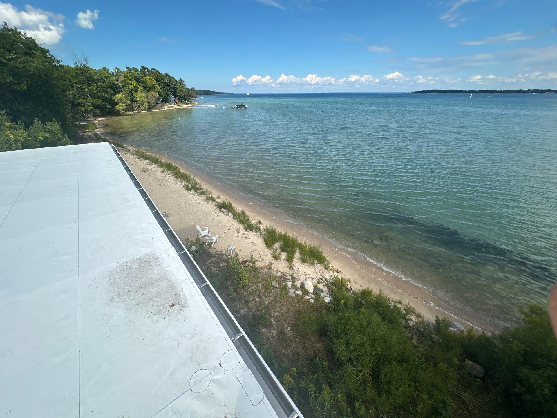 New Gutter System Installation for Suttons Bay Waterfront Home by Rainbow Seamless Systems