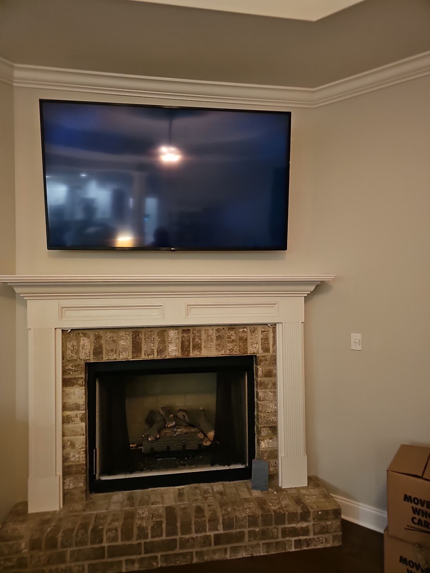 Fireplace TV Mounting Projects by Hangman Mounting & Installation 
