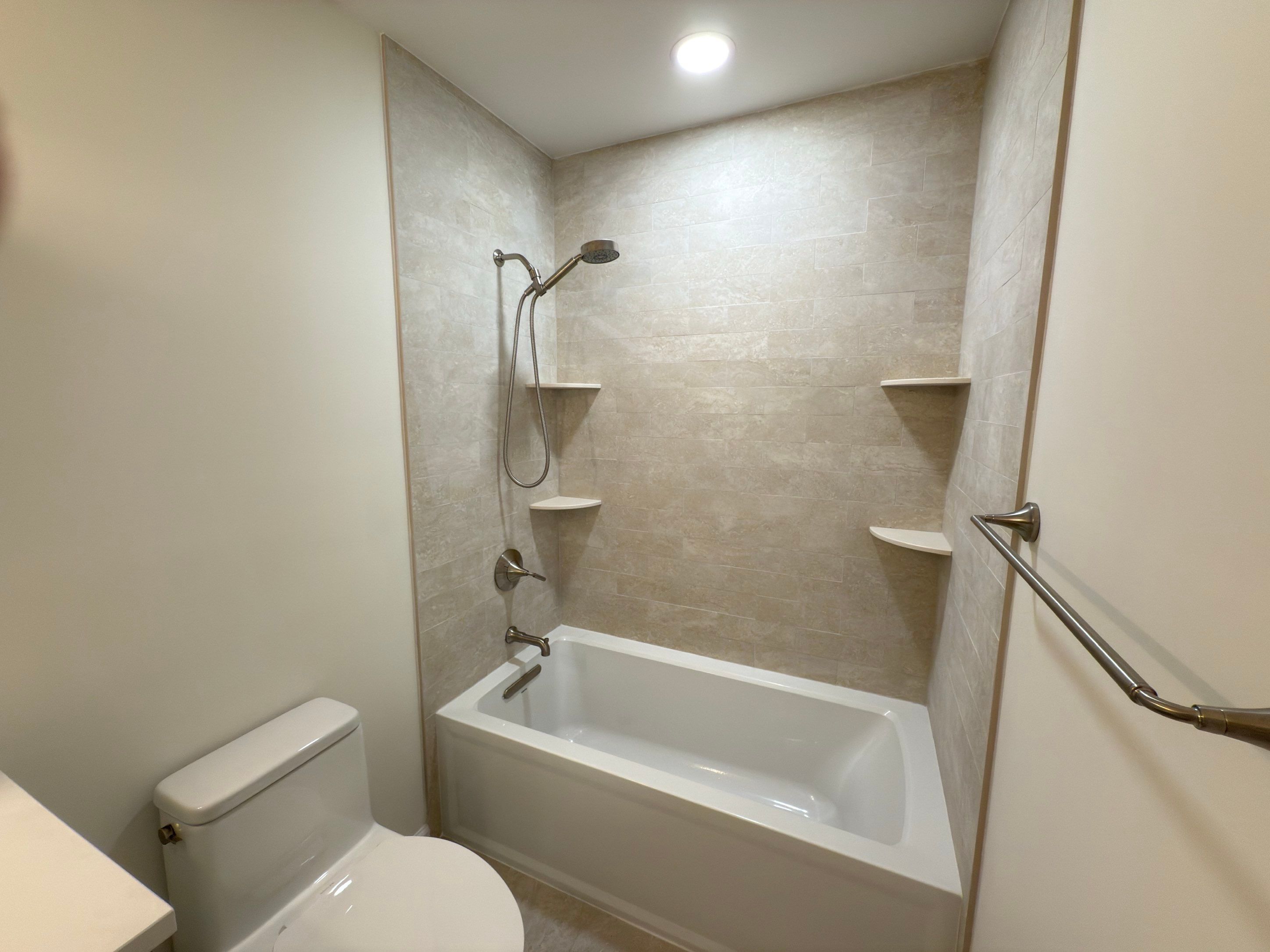 Bathroom Remodel using Tile by Home Concepts Construction