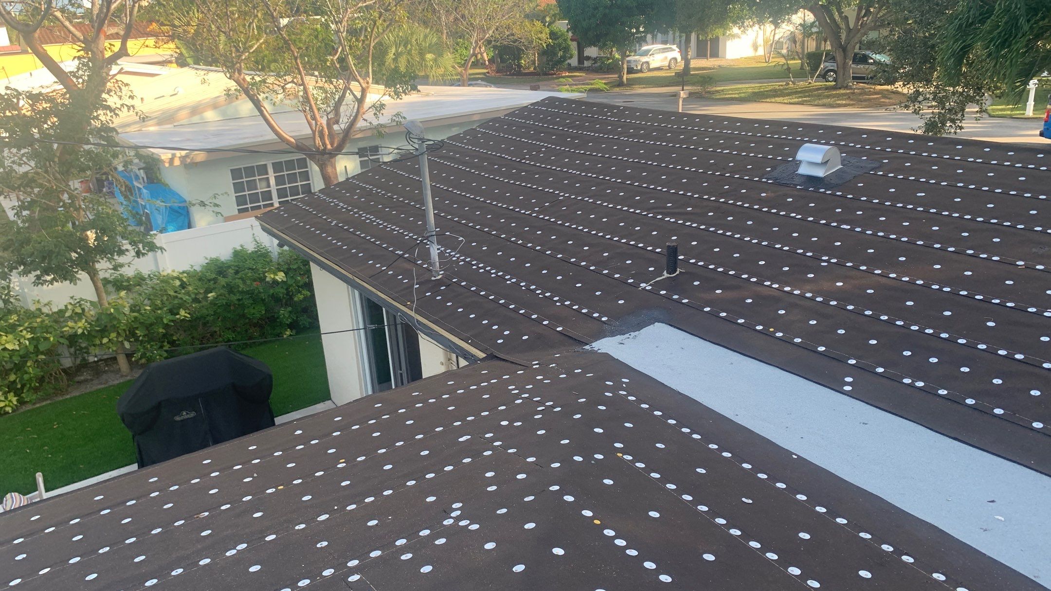 Residential Roofing Installation using 1" Nail strip metal roof by BLUES BROTHERS ROOFING