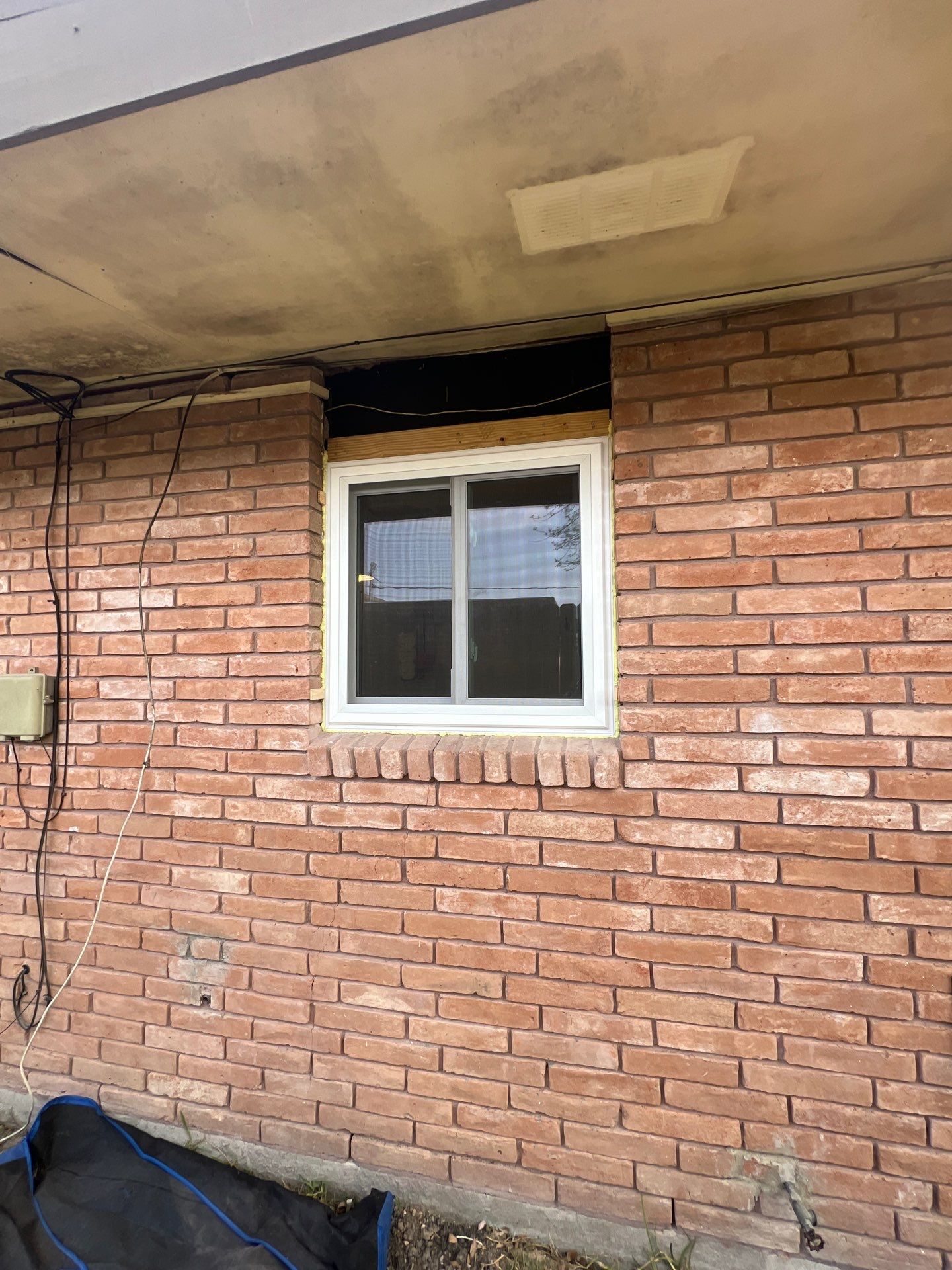 Windows in Brick with a Bay Window by Bayfront Roofing and Construction