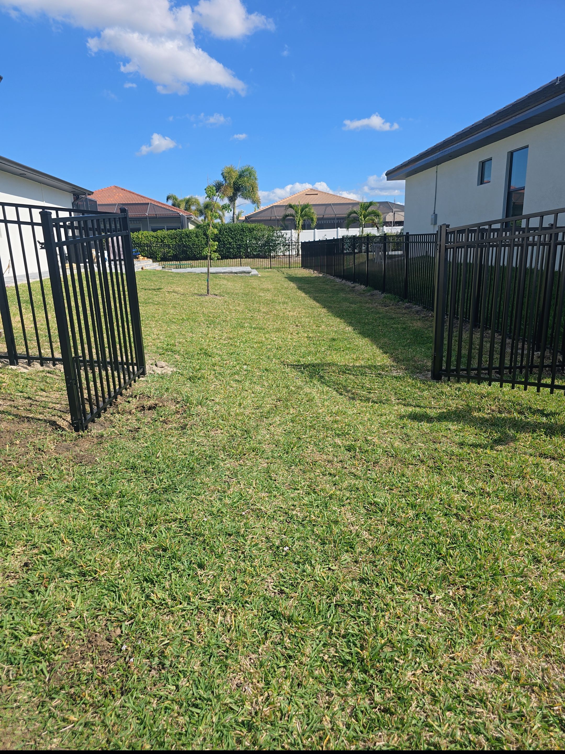 Bronze Aluminum Fence in Cape Coral by True Fence LLC