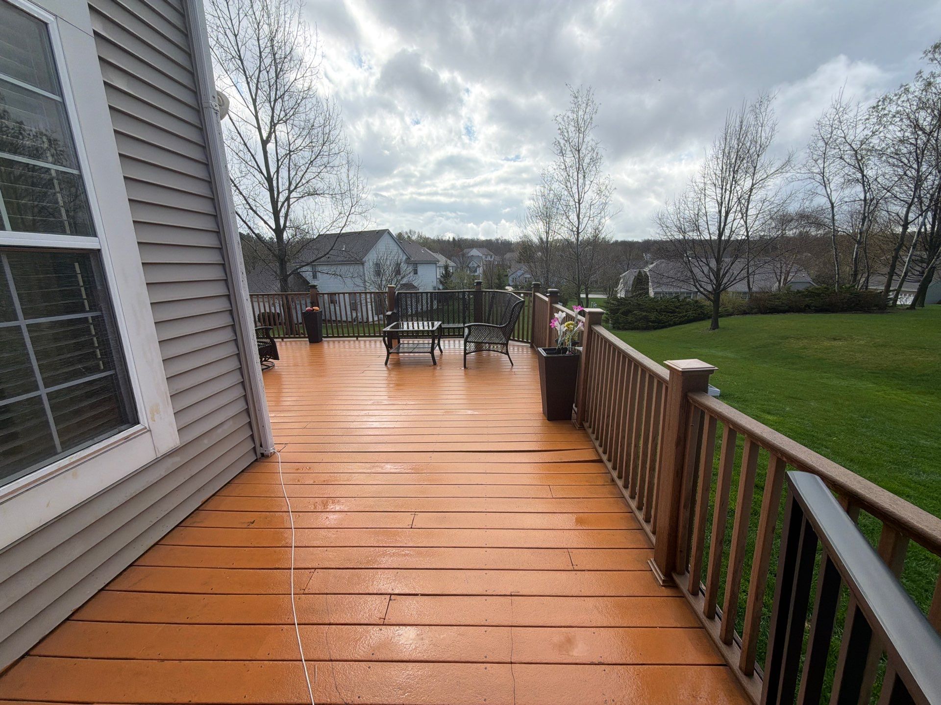 Elevated Wood Deck Refinishing and Railing Restoration in Waukesha by OCS Contracting Services