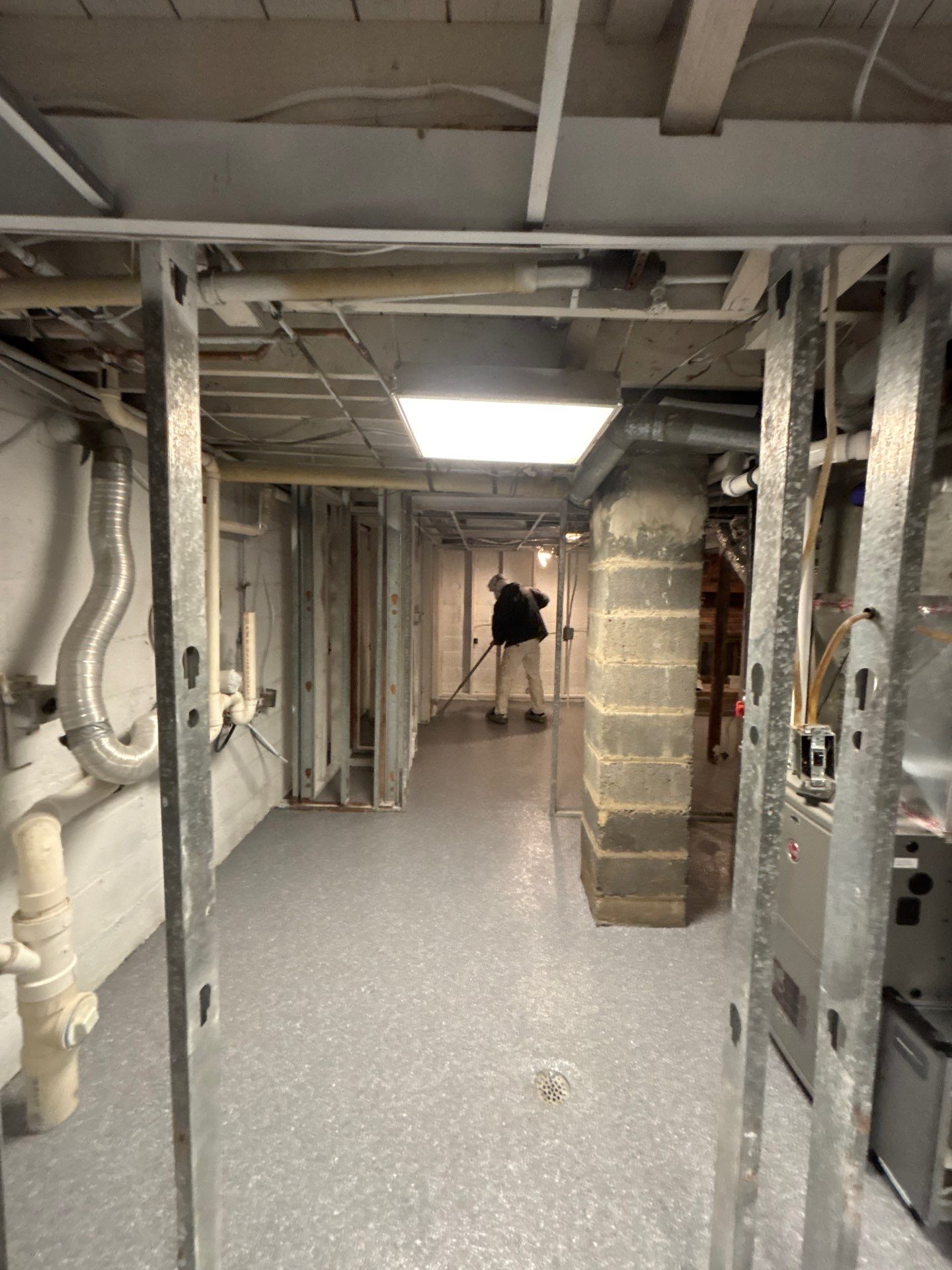 Basement Concrete Floor Coating with Penntek Flake System by Spectrum Painting, LLC