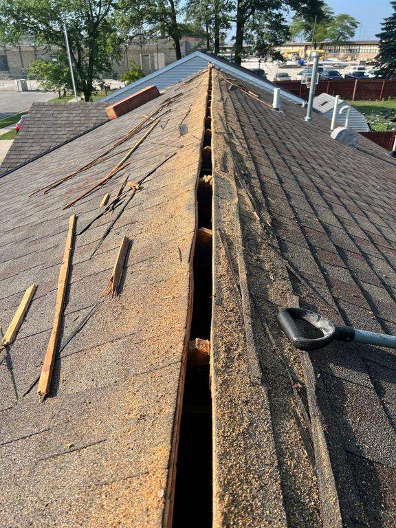 Residential Roofing Repair using Ridge vent replacement by Nitro Roofing and Construction