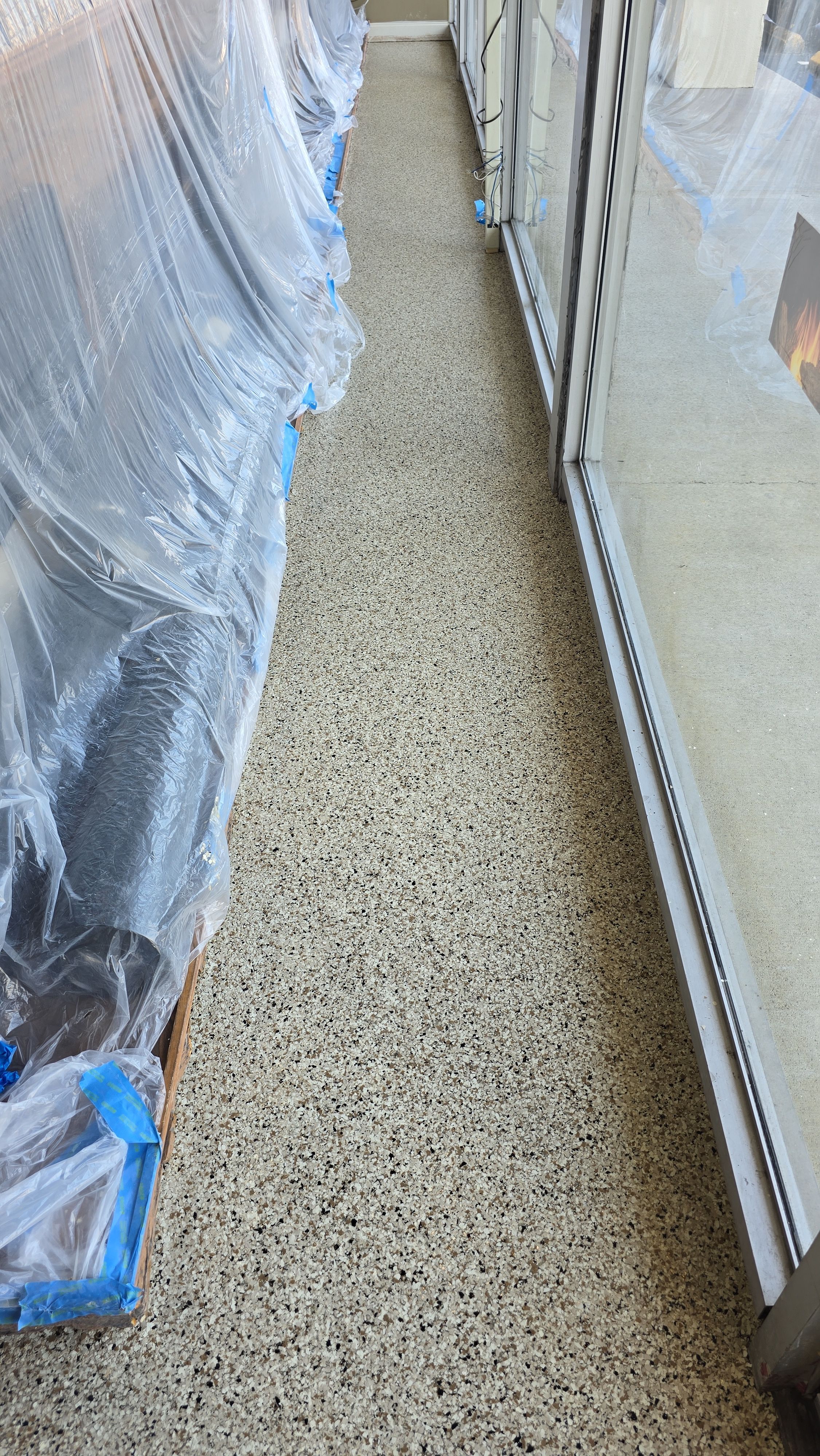 Fireplace Showroom Remodel using Shoreline! by Elite Floor Solutions