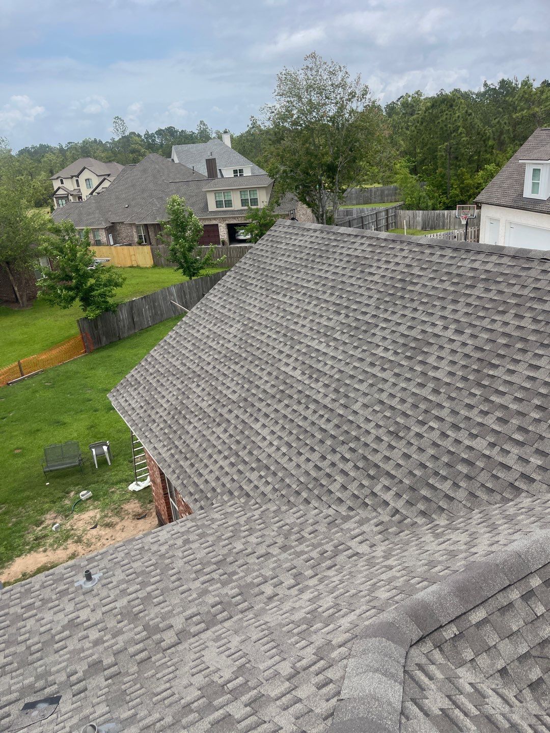 Residential Roofing Installation using Roof Replacement by American Roofing & Construction LLC
