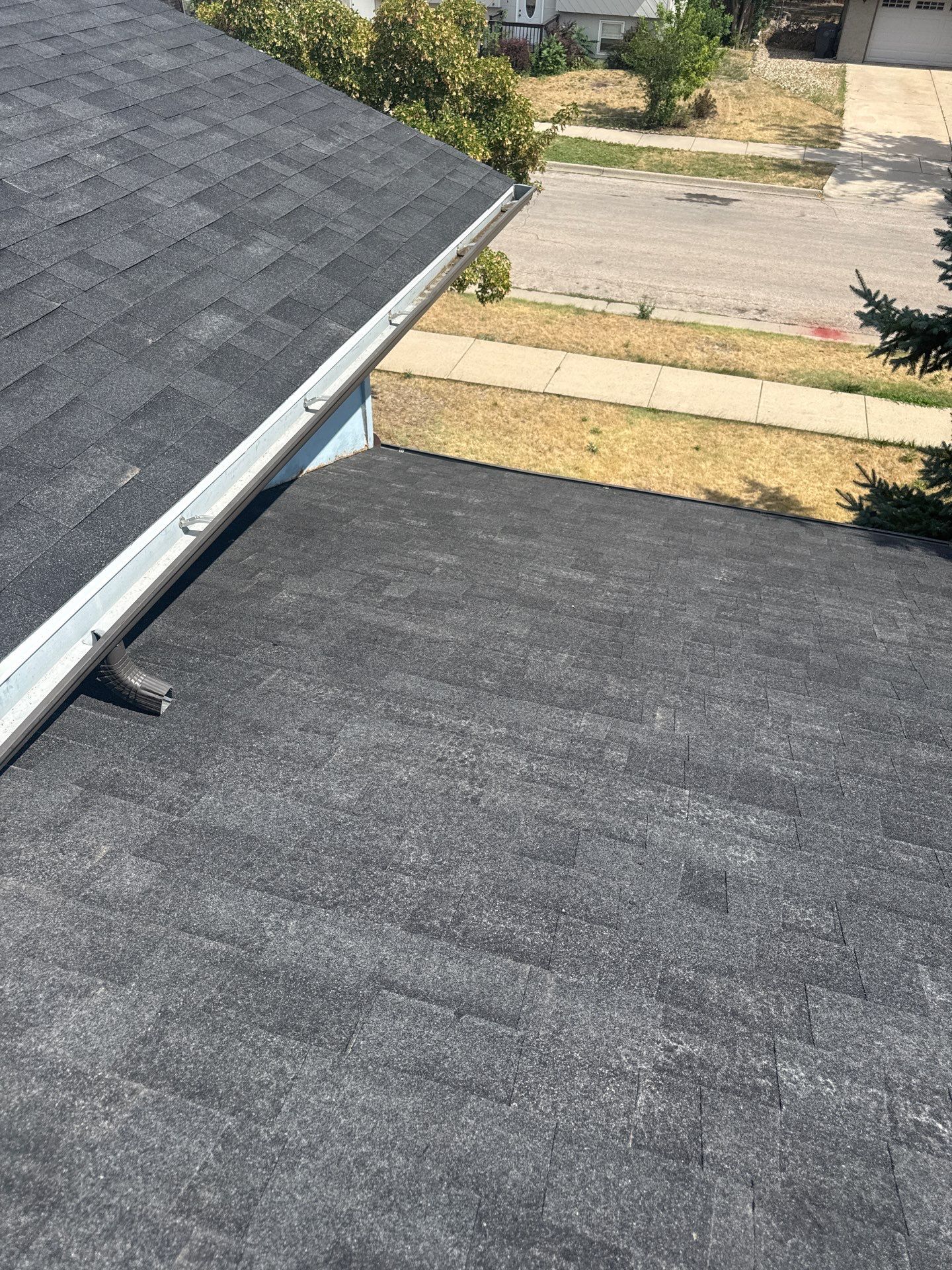 Full Architectural Shingle Roof Replacement and Gutter Installation in Rapid City by Weather-Tite Exteriors LLC