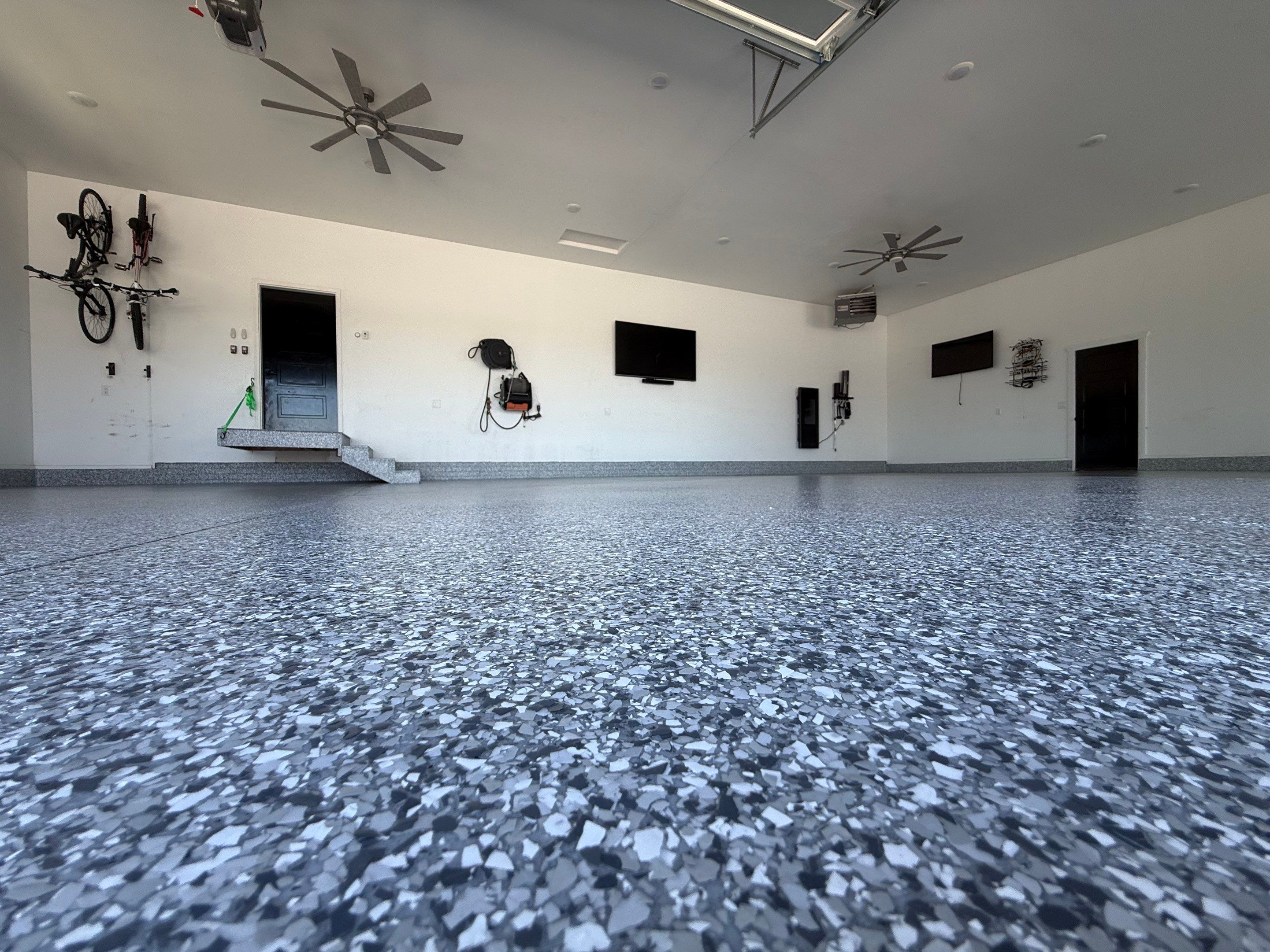 Gravel Flake Garage Floor Coating in Yankton by Select Painting, Coatings & Garage Cabinets