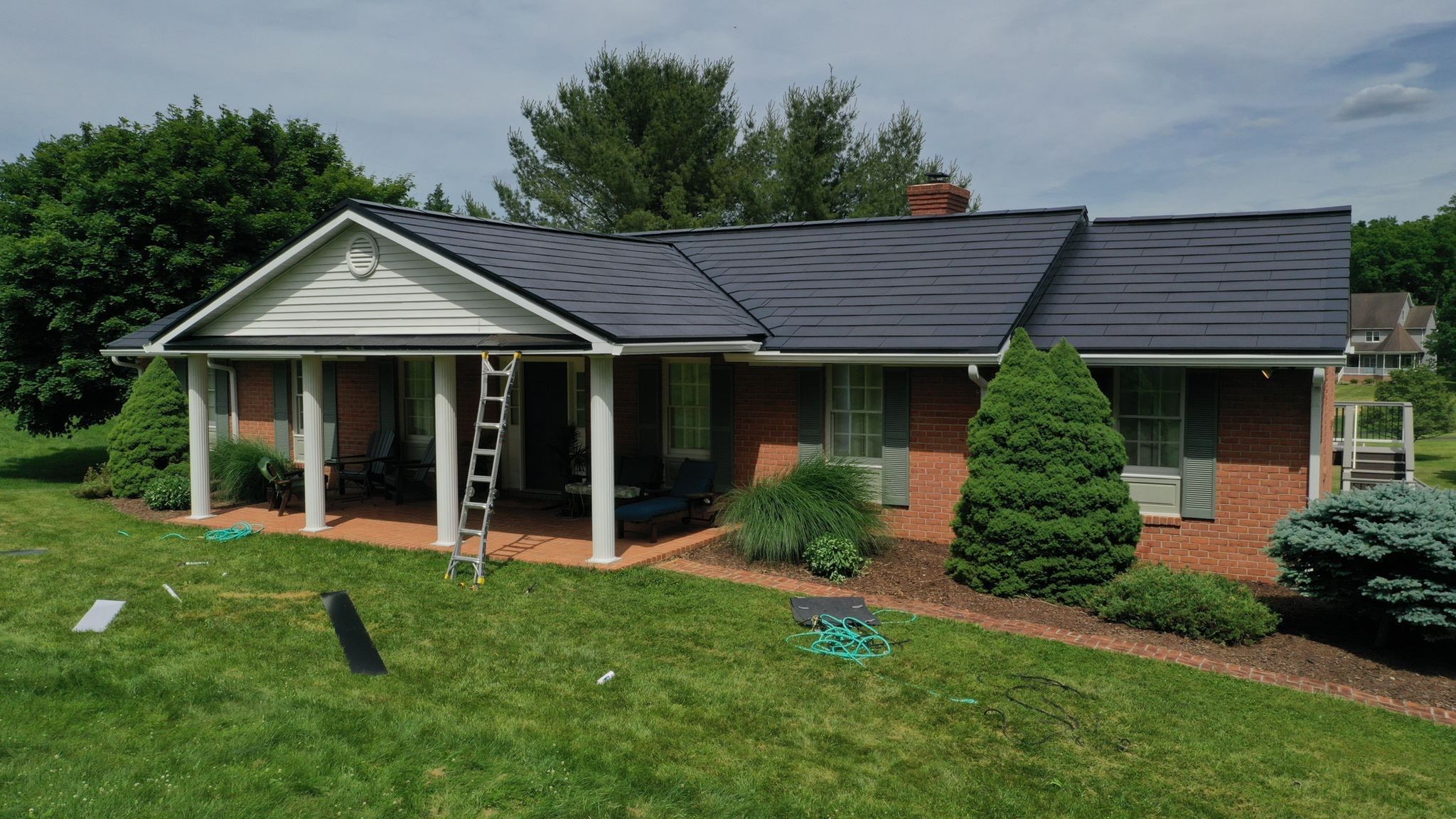 Tesla Solar Roof Installation by American Home Contractors