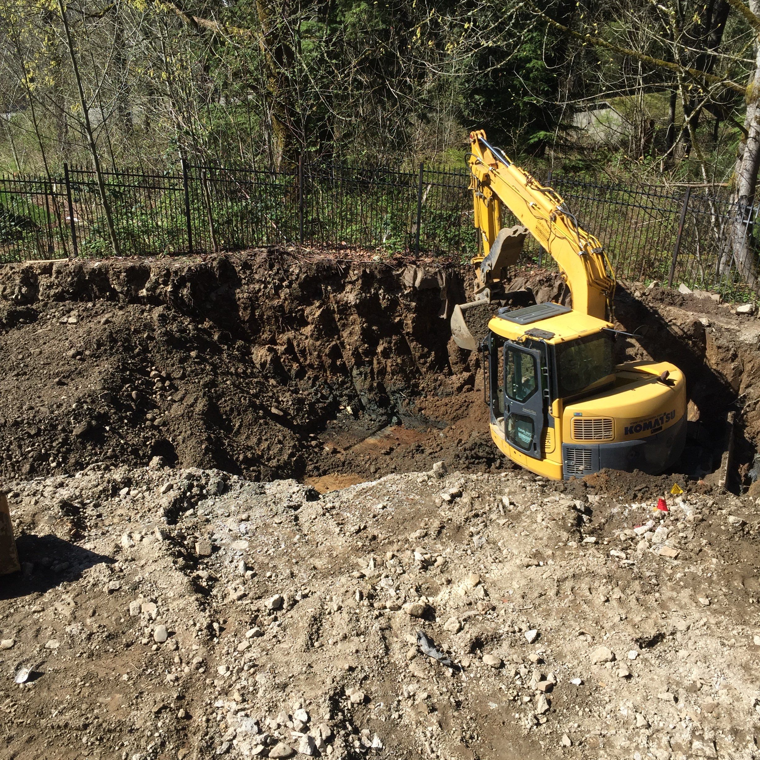 Asphalt Driveway and Stamped Concrete Patio Finish  by Jireh Asphalt & Concrete Inc 