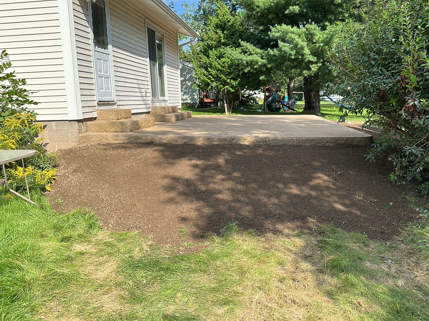 Bluestone textured stamped concrete patio by NG Masonry & Construction LLC