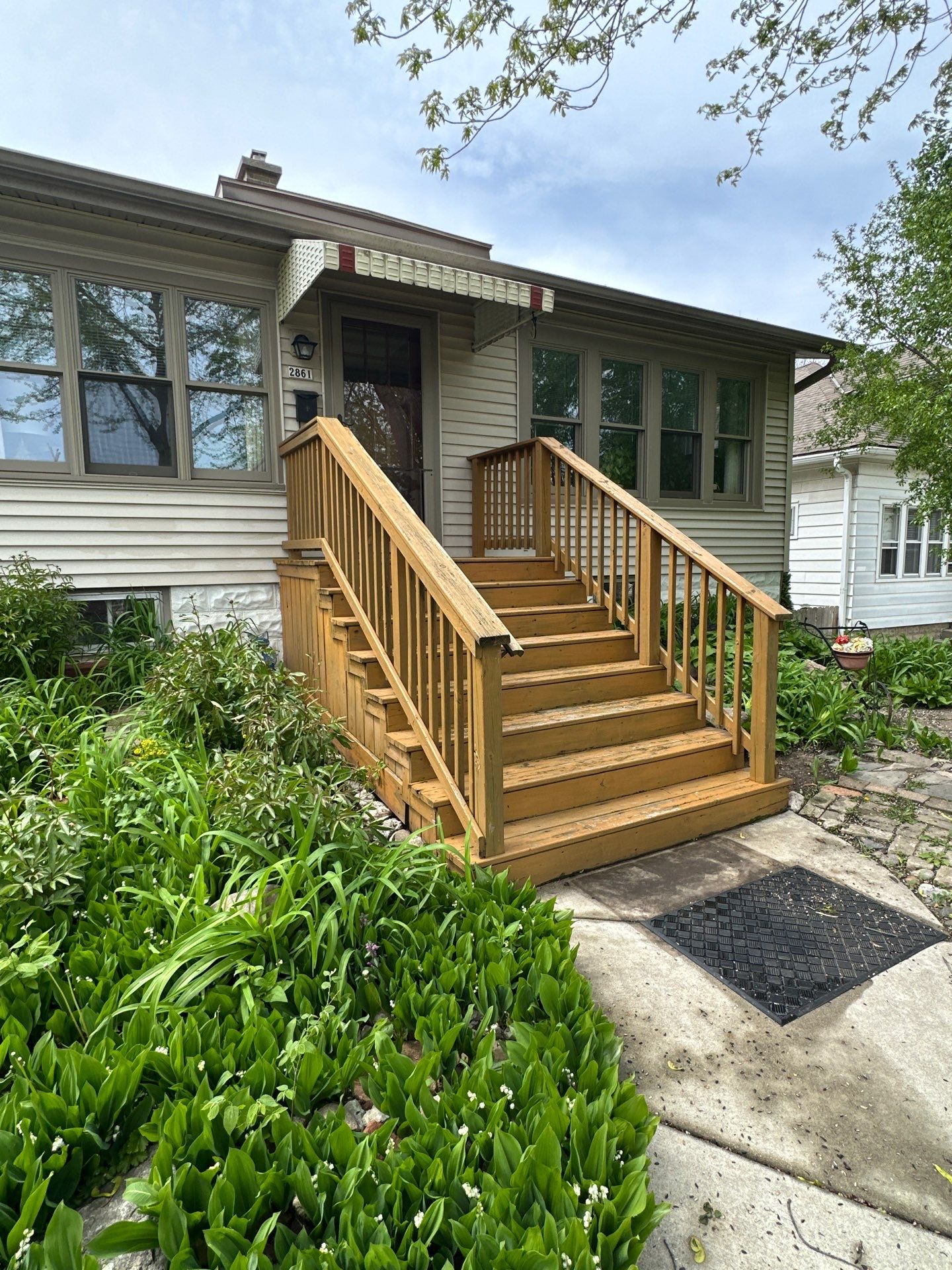 New Wooden Deck and Front Entry Stair Installation in Milwaukee by OCS Contracting Services