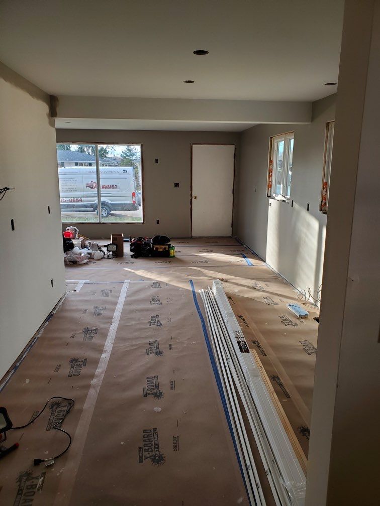 Interior Renovations, Kitchen Remodel, and Window Replacement by Ivy Lea Construction