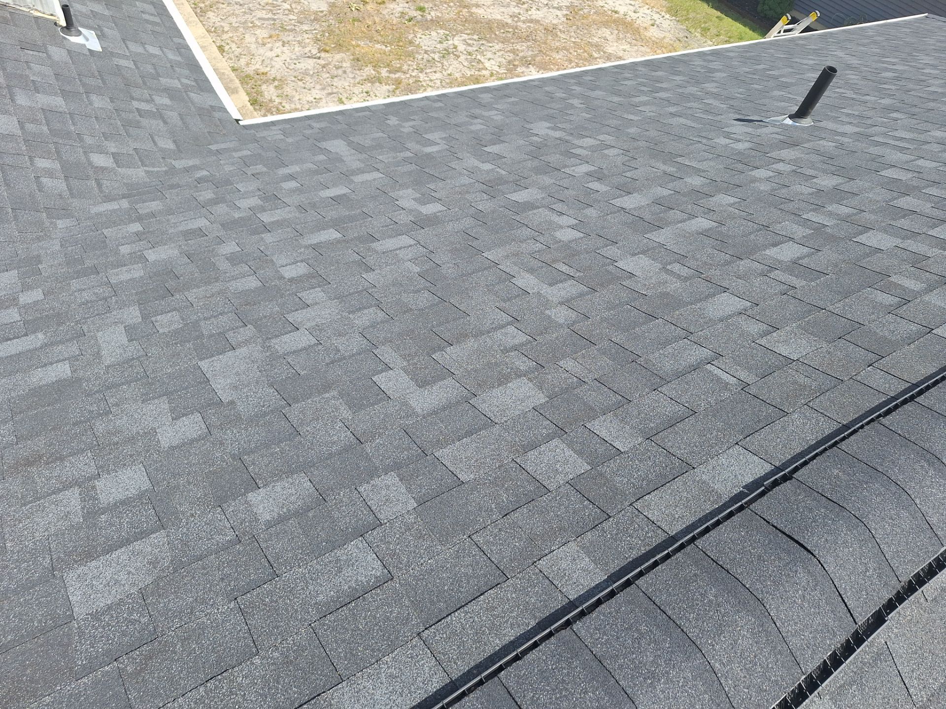 Estate Gray Shingles by Reimagine Roofing