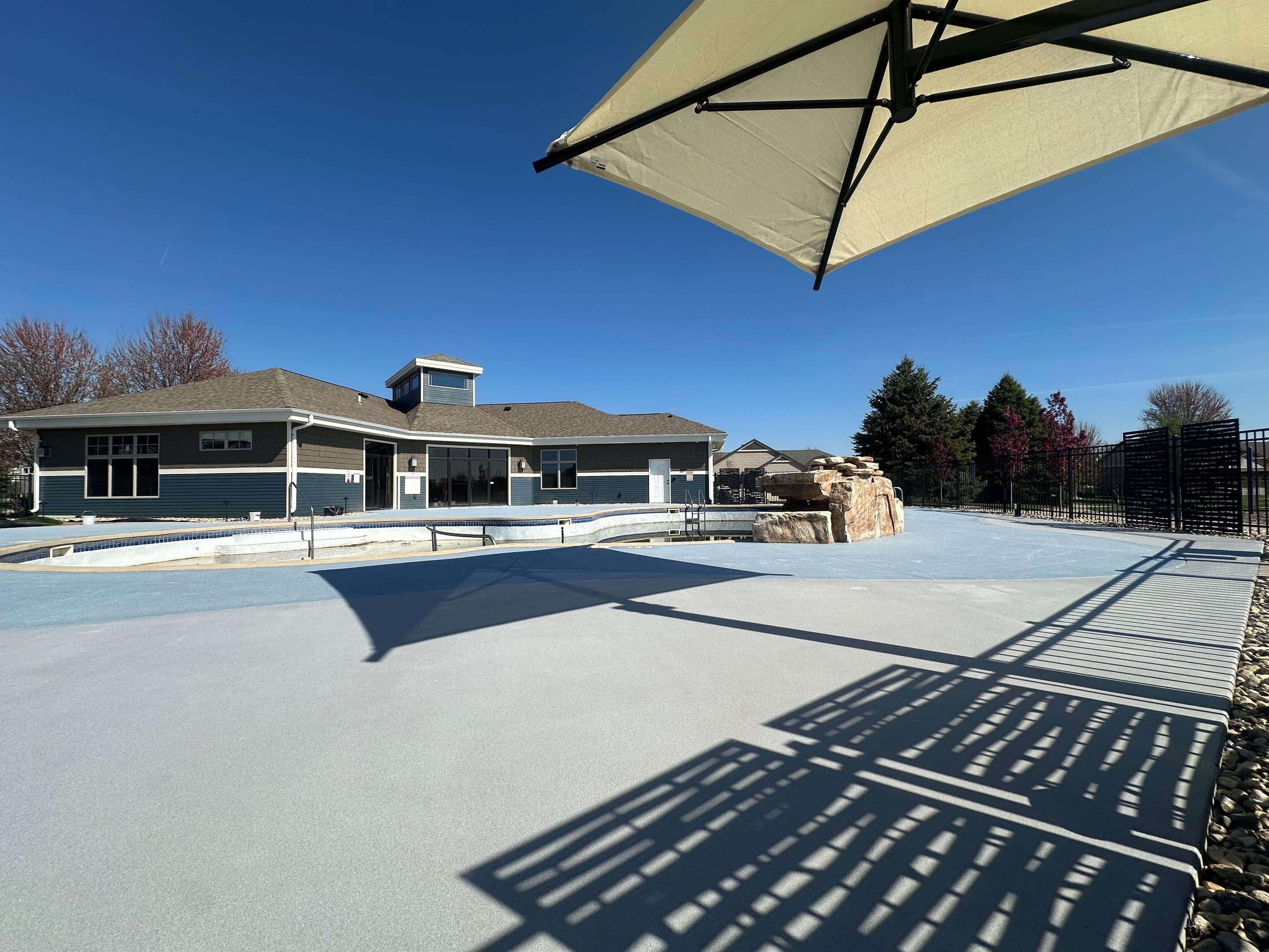 Arbors Edge Pool Deck Restoration and Textured Concrete Coating by Select Painting, Coatings & Garage Cabinets