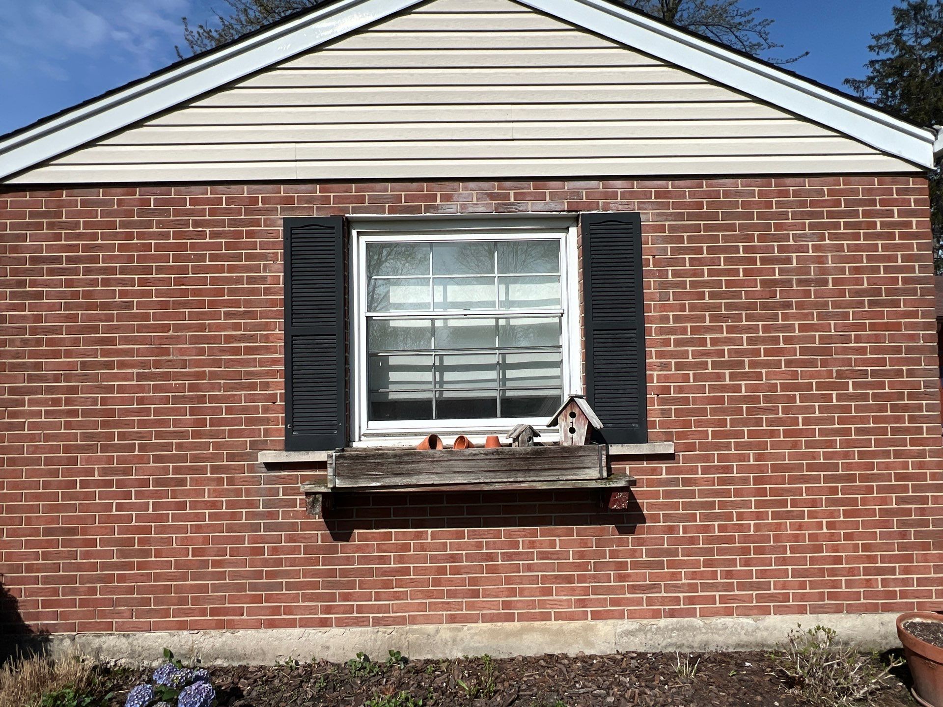 Housewashing  using Algaecide, soft wash soap by Northern Power Washing LLC.