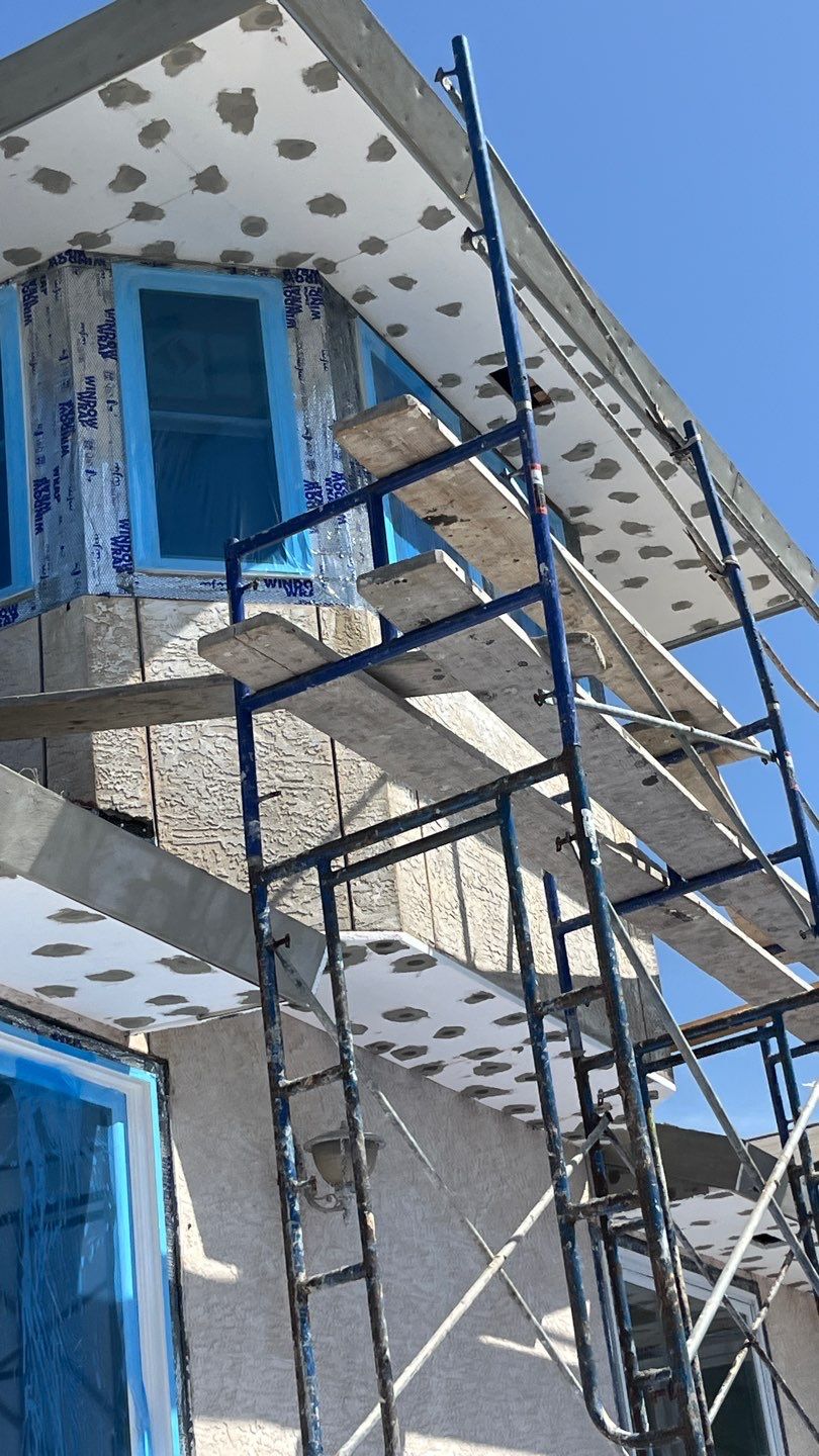 Installing Windows on a Submarine  by Bayfront Roofing and Construction