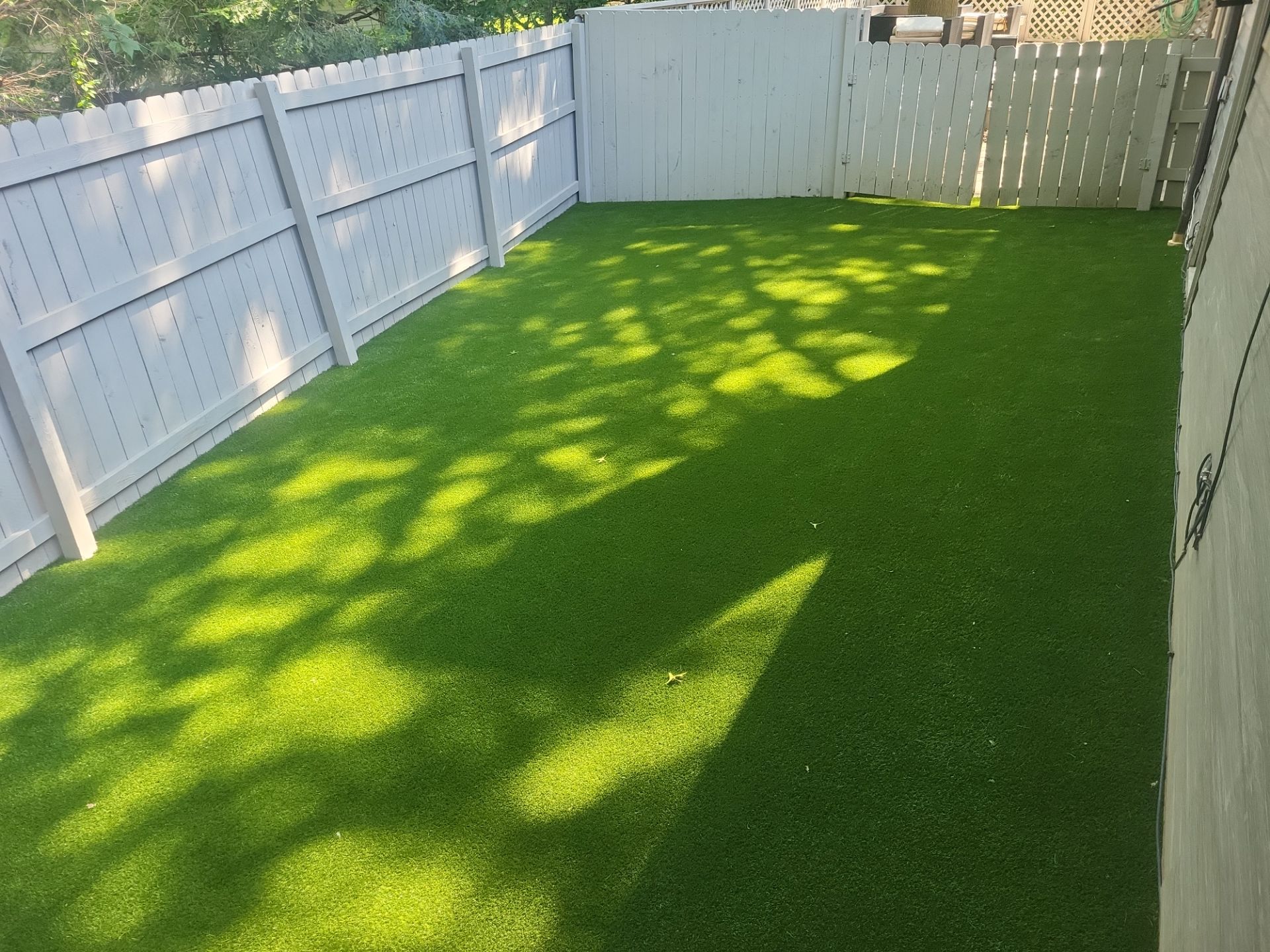 Synthetic Turf Installation for a Residential Backyard in Westlake by Southwest Greens Midwest