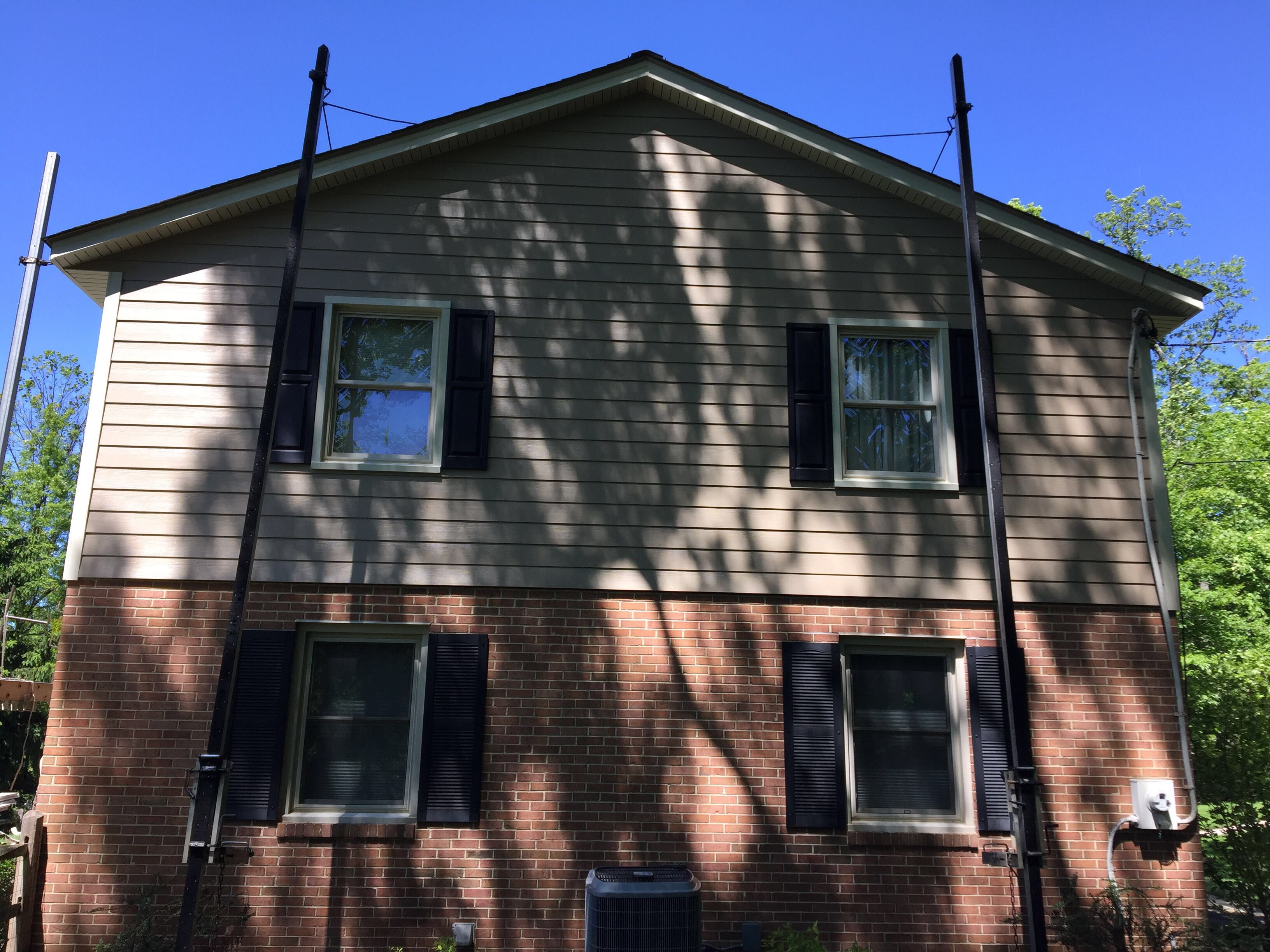 Siding and Roof Replacement by American Home Contractors