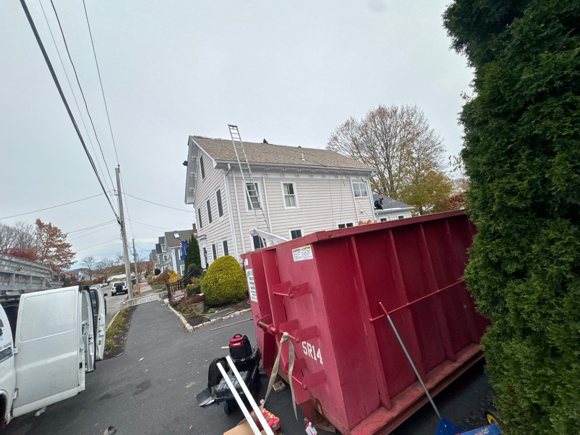 Newburyport Complete Roof Replacement with Solar Venting Skylight by Mighty Dog Roofing of Greater Middlesex County