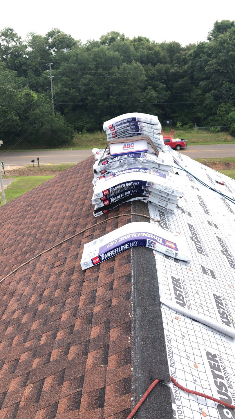 Residential Roofing Installation using Roof Replacement by American Roofing & Construction LLC