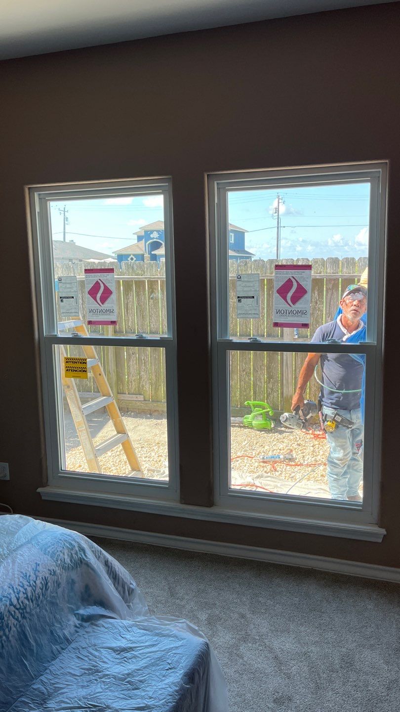 Curved Trim Windows by Bayfront Roofing and Construction